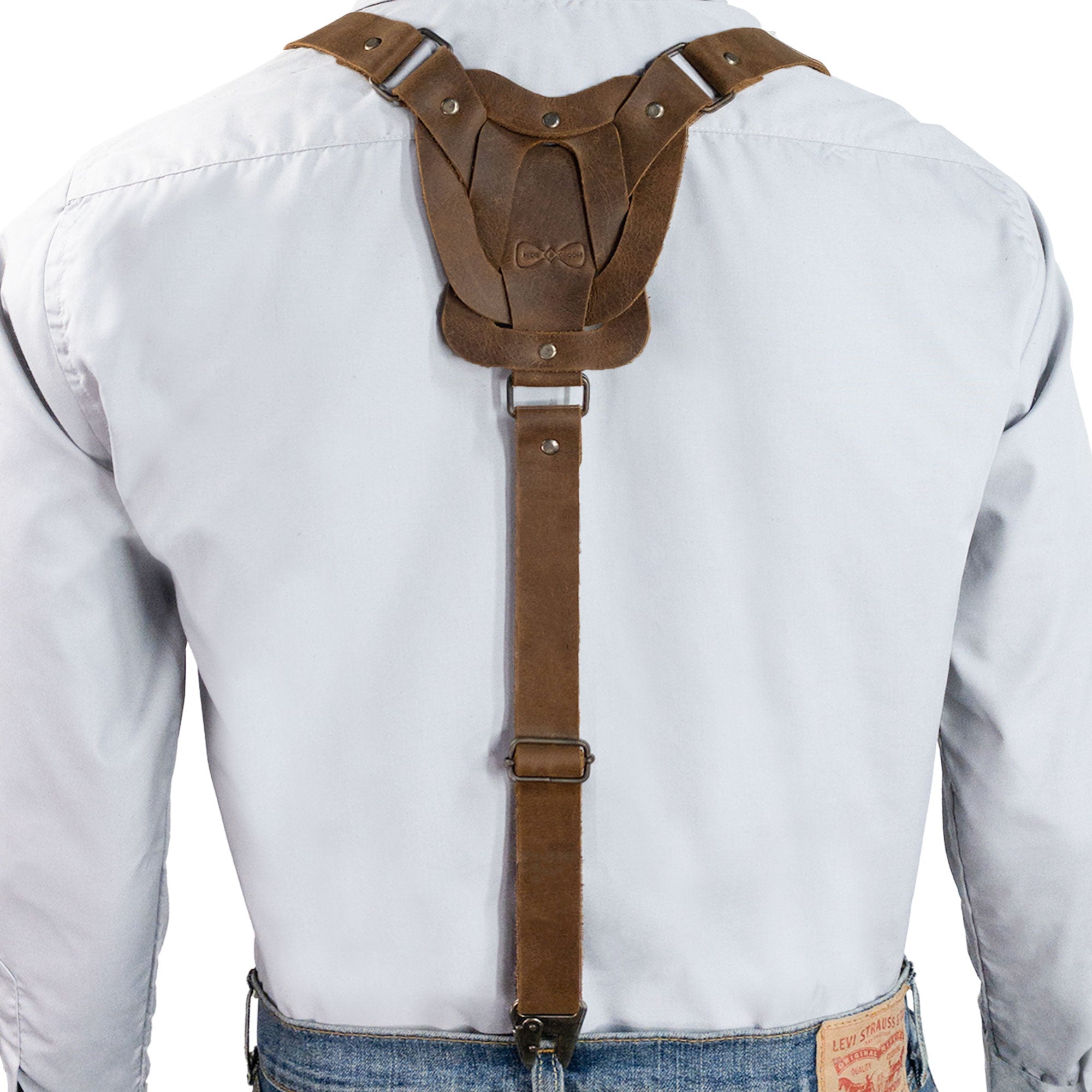 Back view of Rustic Suspenders with Adjustable Size Straps for Men by Hide & Groom, crafted from Full Grain Leather. These artisanal suspenders are perfect for weddings and Steampunk themes, showcasing small batch production and handmade quality from La Antigua Guatemala.