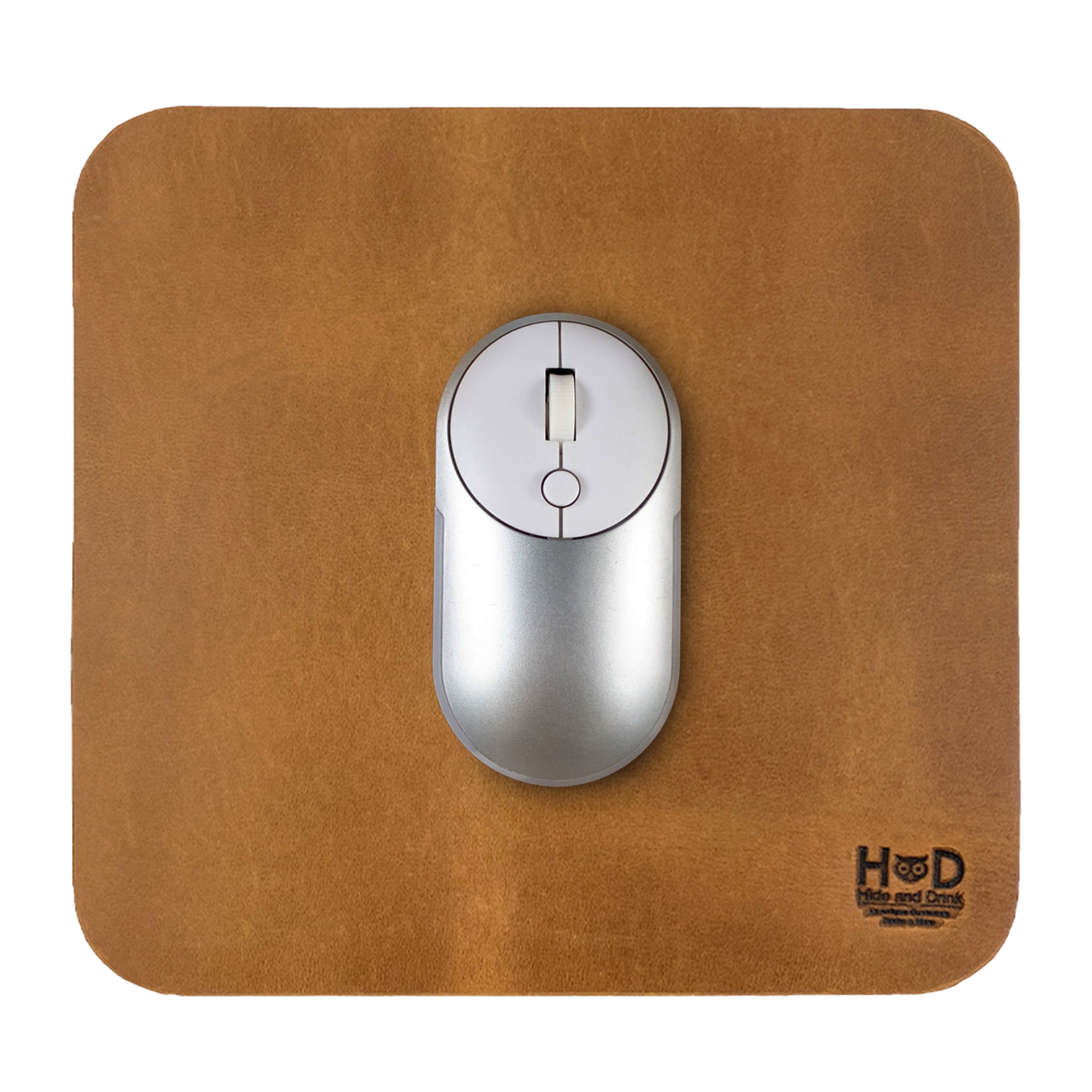 Hide & Drink Mousepad displaying a classic orange hue, designed for optimal mouse performance. This artisan-crafted mousepad features a non-slip base and is made in La Antigua Guatemala & Oaxaca Mexico.