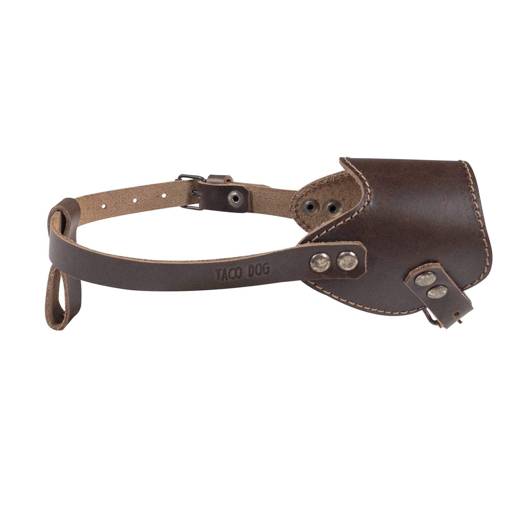 Close-up view of the Adjustable Dog Muzzle by Taco Dog, highlighting its durable full grain leather construction and adjustable strap for a custom fit. This beautiful muzzle is handmade in La Antigua Guatemala, ensuring unique artisan quality for your pet.