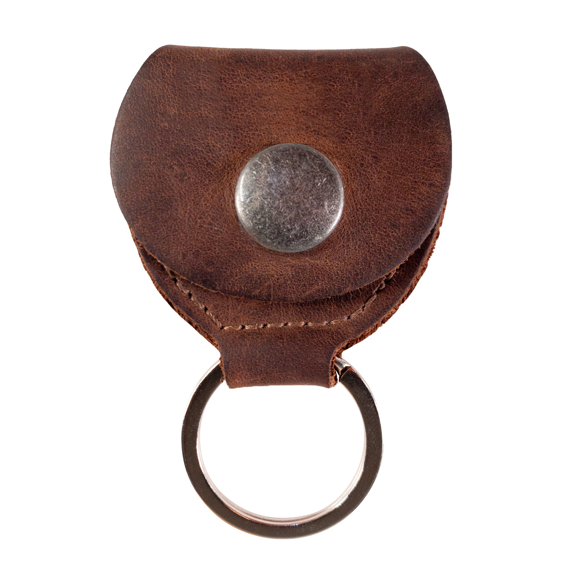 Featuring the elegant design of the Key Chain & Guitar Pick Holder by Hide & Drink, this image captures the durable and functional Guitar Pick Holder with Ring, perfect for guitar players. The Full Grain Leather construction reflects the brand's commitment to small batch production and artisan craftsmanship, hand cut and hand sewn in La Antigua Guatemala & Oaxaca Mexico.