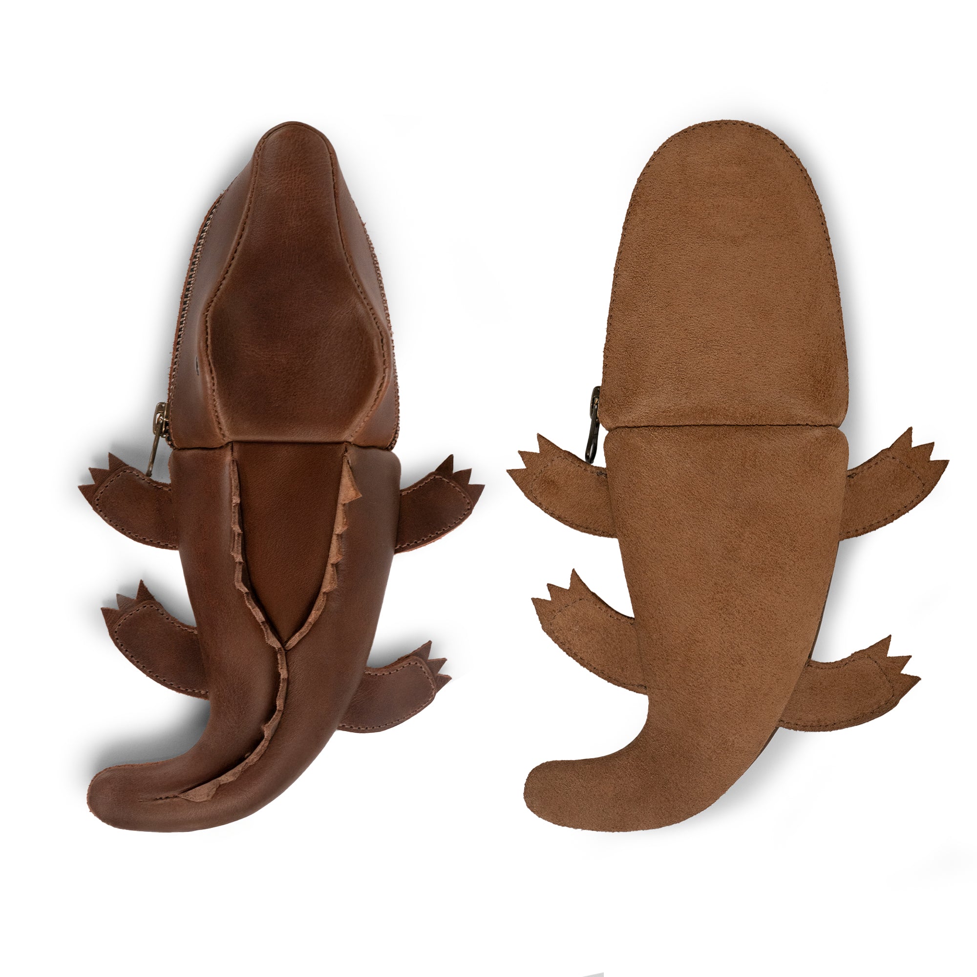 Back and front view of the Leather Gator Pouch by Tudi Frudi, showcasing its unique crocodile-shaped design. This Gator Leather Pouch is ideal for multiple uses, including as a crocodile-shaped pencil pouch and a small charger cable holder. Crafted from full grain leather, it features small batch production with hand cut and sewn details, making it a perfect change bag or scissors case. Handmade in La Antigua Guatemala & Oaxaca, Mexico, this artisan product is designed for the stylish organizer.