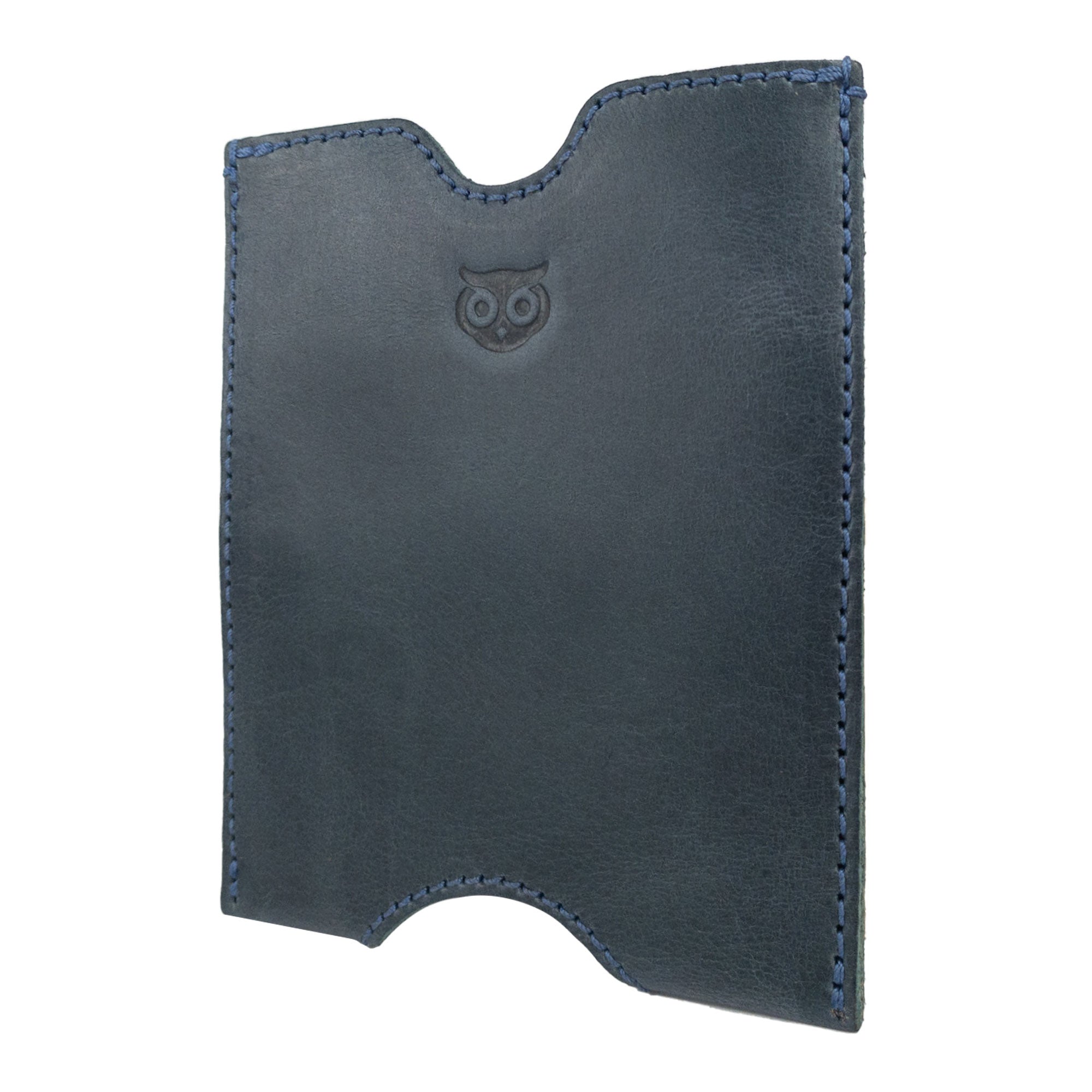 Side view of the Hide & Drink Passport Sleeve, highlighting its elegant design and craftsmanship. This full grain leather travel passport pocket sleeve is both attractive and functional for all your travel needs. Features tags: Travel Passport Pocket Sleeve, Full Grain Leather, StockyardX, Small Batch Production, Hand Cut, Hand Sewn, Fire Branded, Artisan, Handmade in La Antigua Guatemala & Oaxaca Mexico.