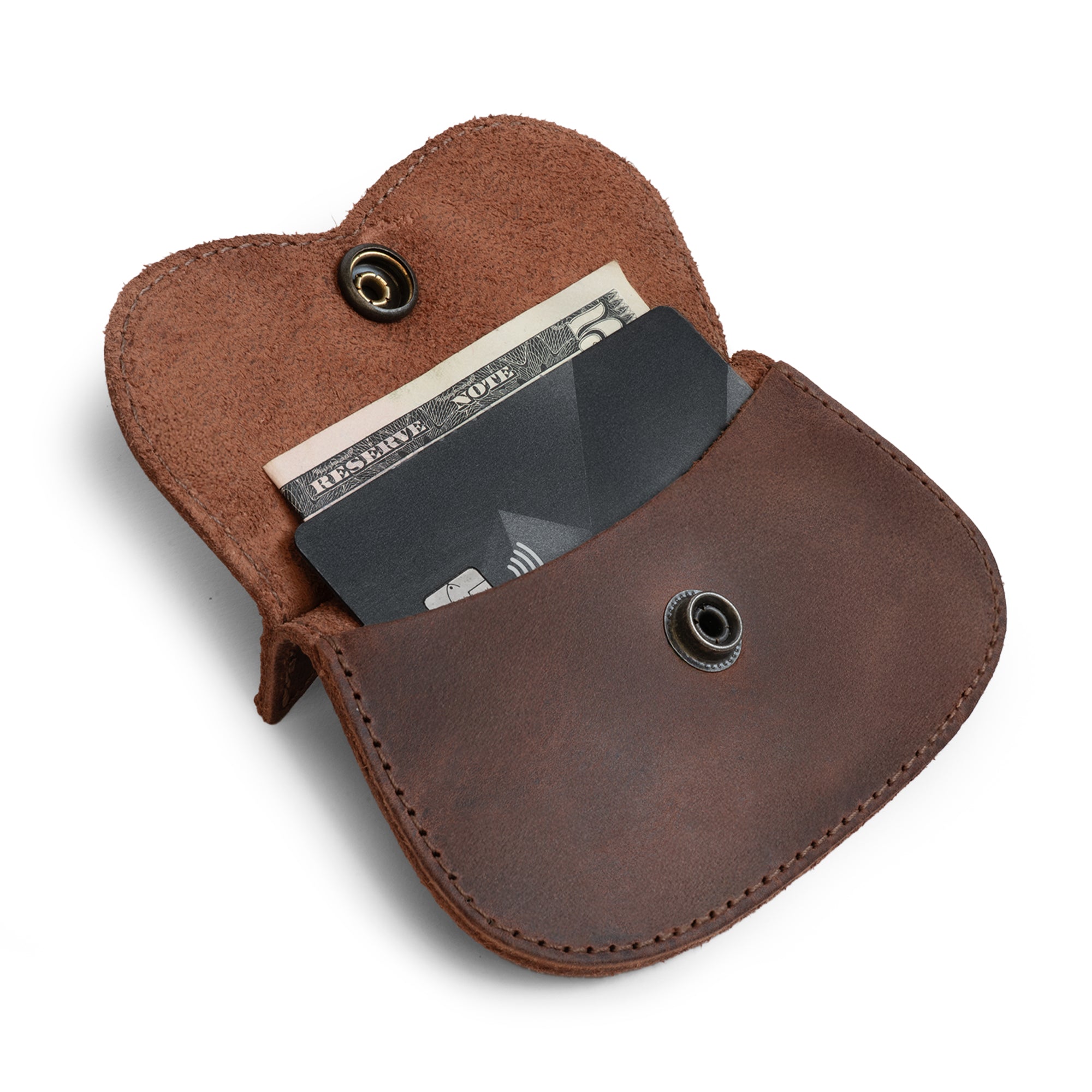 Hide & Drink Leather Cat Wallet with a button closure, made from premium Full Grain Leather. This multi-functional Cat-Shaped Wallet works as a Coin Case and Money Holder, handcrafted by artisans in La Antigua Guatemala & Oaxaca Mexico.