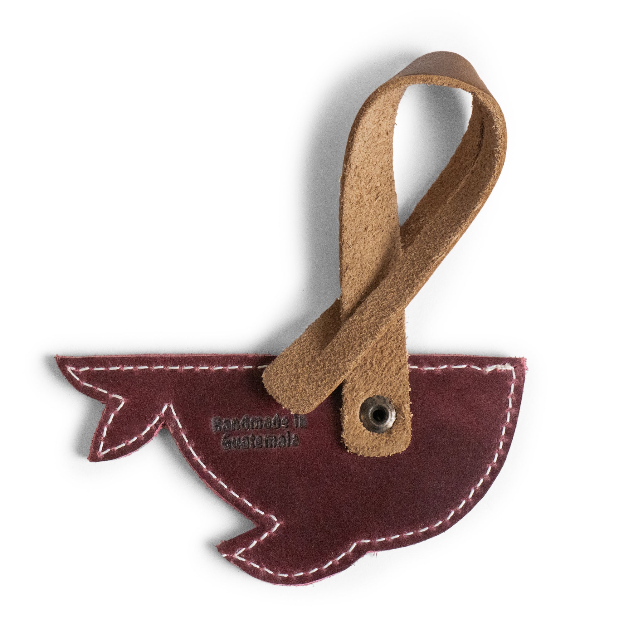 Another view of the Whale Bag Charm by Hide & Drink, showcasing its detailed design and craftsmanship. This Whale Bag Charm for Handbags is a great Purse Charm for Tote & Backpacks, made from full grain leather with a focus on artisan quality. The charm acts as a beautiful ornament for women, embodying small batch production and hand-sewn techniques from La Antigua Guatemala & Oaxaca Mexico.
