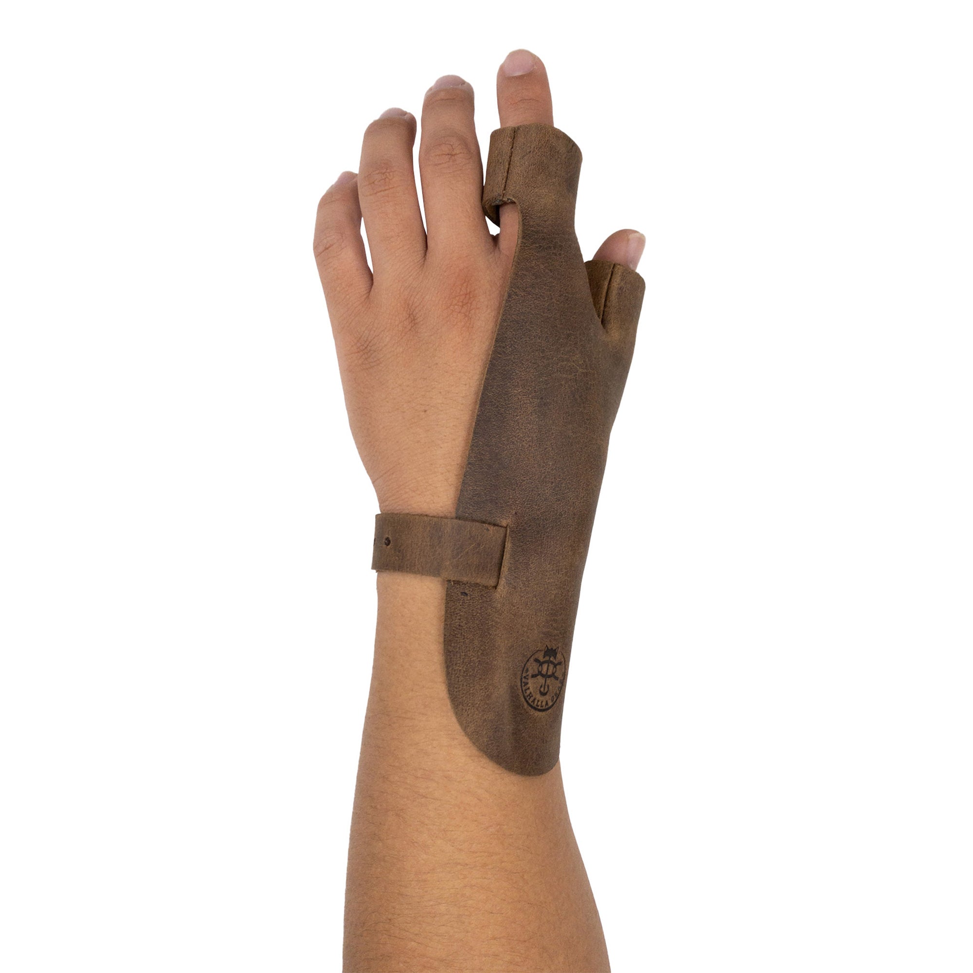 A close-up of the Valhalla Gear Archery Shooting Glove, designed for optimal performance and protection for any archer. This handmade glove is perfect for various archery activities, including targeting practices, cosplay, and offers wrist and finger support while shooting with a Recurve Bow. Crafted in La Antigua Guatemala from Full Grain Leather, this artisan piece reflects quality and craftsmanship.