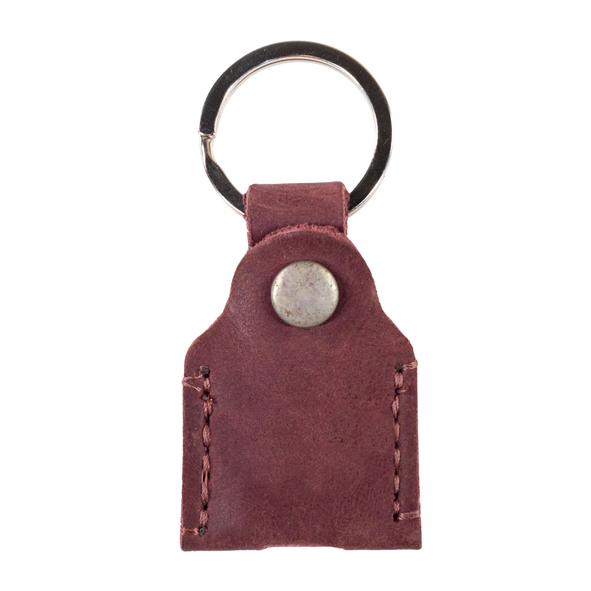 Dimensions of burgundy Hide & Drink Key Holder showcasing its compact size and practicality. This Key Holder is excellent for keeping your keys organized, functioning also as an emergency coin pouch. Handmade from Full Grain Leather in La Antigua Guatemala & Oaxaca Mexico by talented artisans.