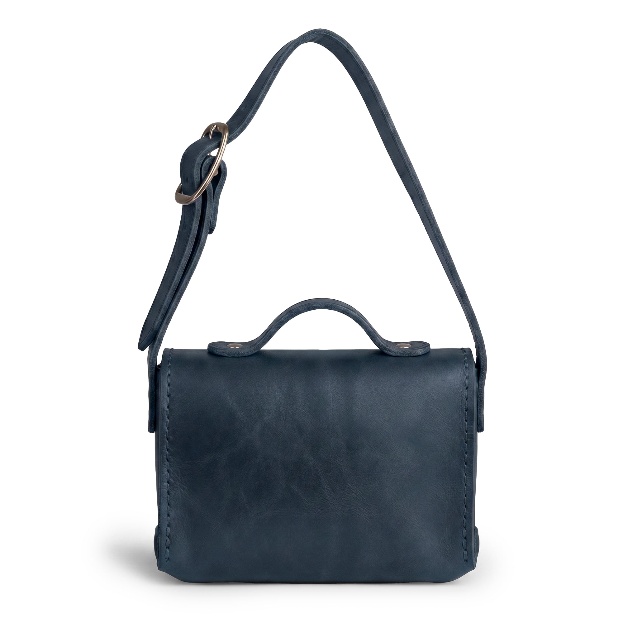 Back view of the deep blue Tiny Messenger Bag by Hide & Drink, emphasizing its stylish details in Full Grain Leather. This Mini Messenger Bag Charm serves as both a keychain for everyday use and a charming handbag accessory, handmade in La Antigua Guatemala.