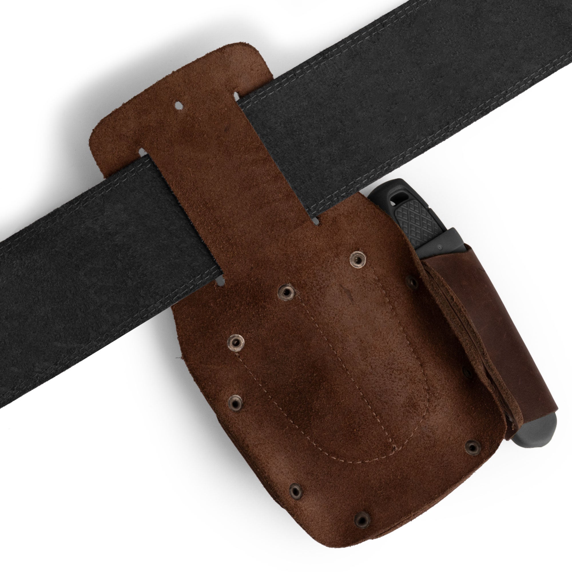 Hide & Drink Tape And Knife Holder attached to a belt, showcasing its versatility. This practical Tape & Knife Holder is essential for keeping your tools organized. Made of durable full grain leather, it doubles as a pocket belt pouch. Artisan crafted and fire branded, handmade in La Antigua Guatemala for lasting quality.