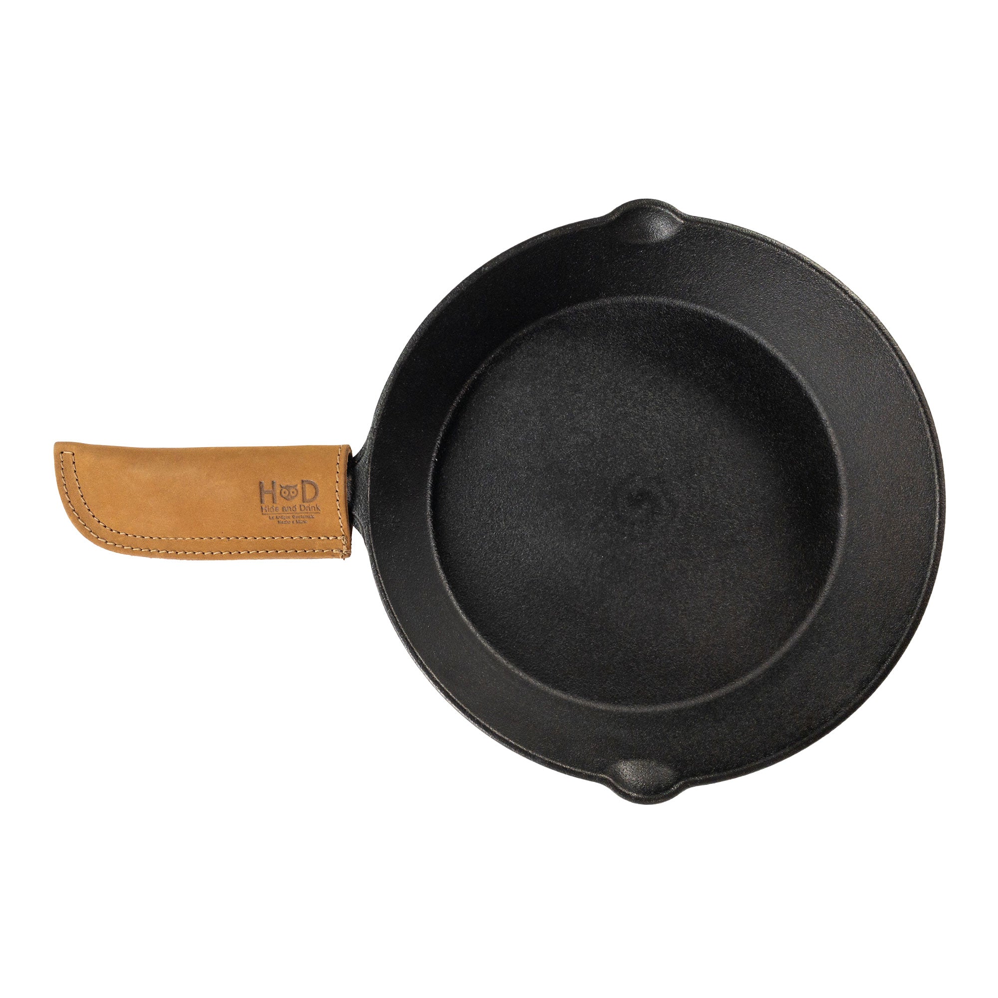 Hot Pan Handle Cover by Hide & Drink, showcasing an ergonomic design for a sturdy grip on hot cookware, crafted from full grain leather in La Antigua Guatemala & Oaxaca Mexico.