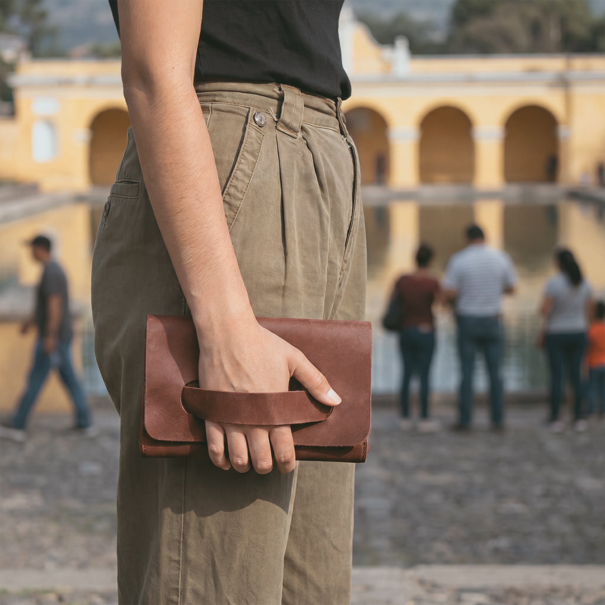 Rich maroon Clutch Bag With Handle from Hide & Drink, made from premium Full Grain Leather. This versatile Clutch Bag with Handle is perfect for women as a handbag or night bag, lovingly crafted by artisans from Guatemala and Mexico.