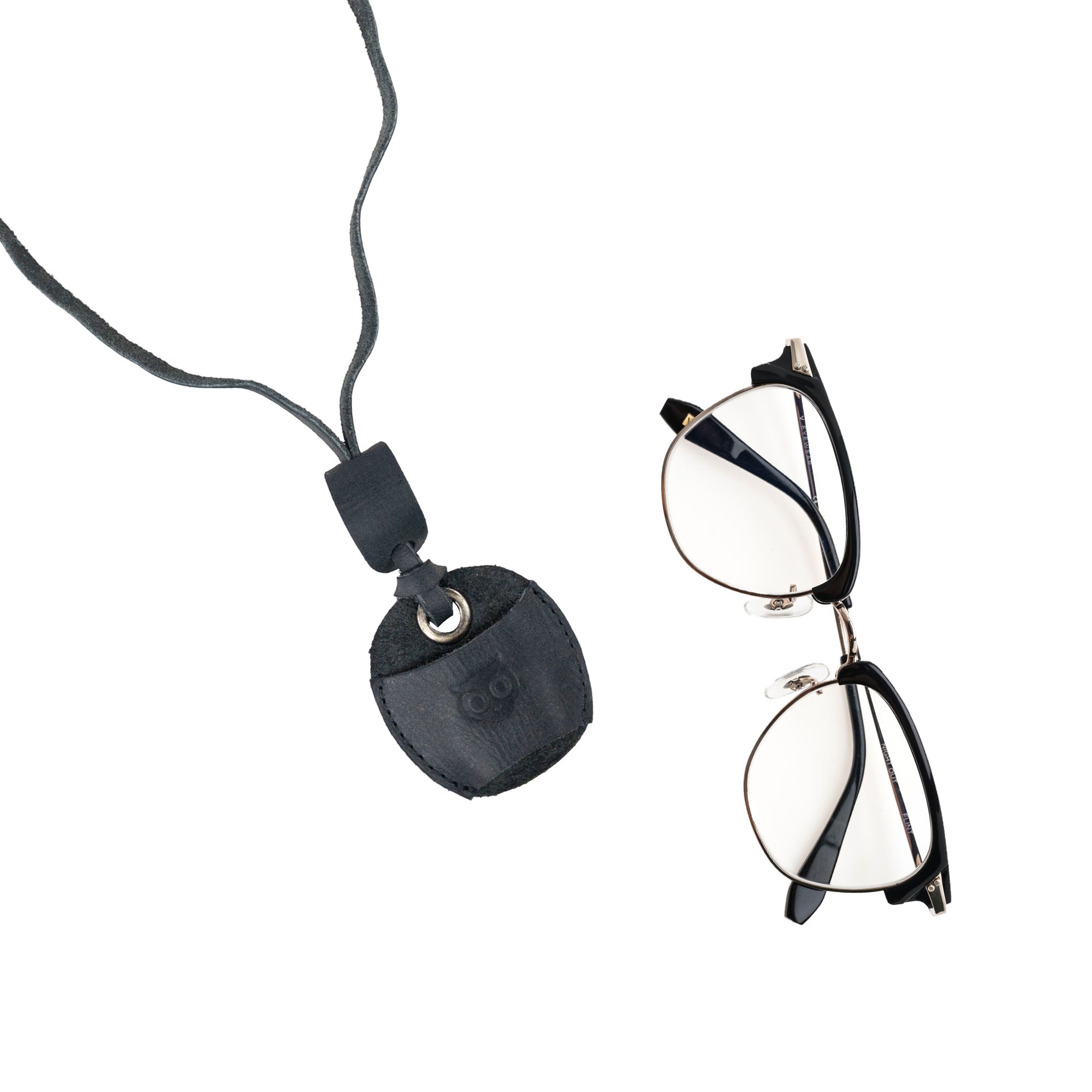 Hide & Drink Eyeglasses Holder presented elegantly, highlighting craftsmanship and practical use. A stylish Eyeglasses Holder made of high-quality full grain leather, suitable for both genders. Handmade in La Antigua Guatemala & Oaxaca Mexico.