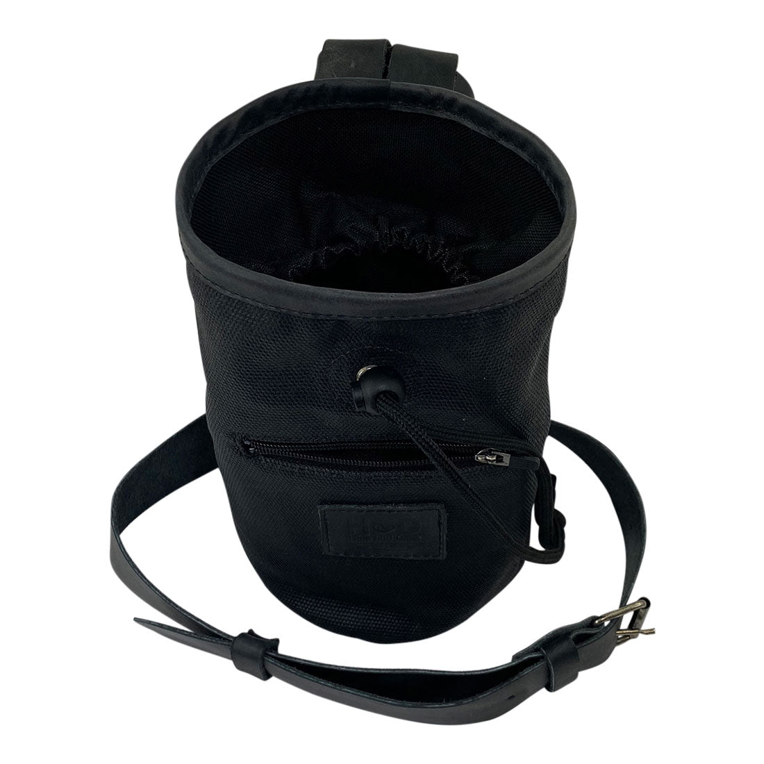 Hide & Drink Chalk Bag top view demonstrating its craftsmanship, made from Waxed Canvas and Full Grain Leather. A great choice for rock climbing and gymnastics, this artisan bag features a zippered pocket and is handcrafted in La Antigua Guatemala & Oaxaca Mexico.