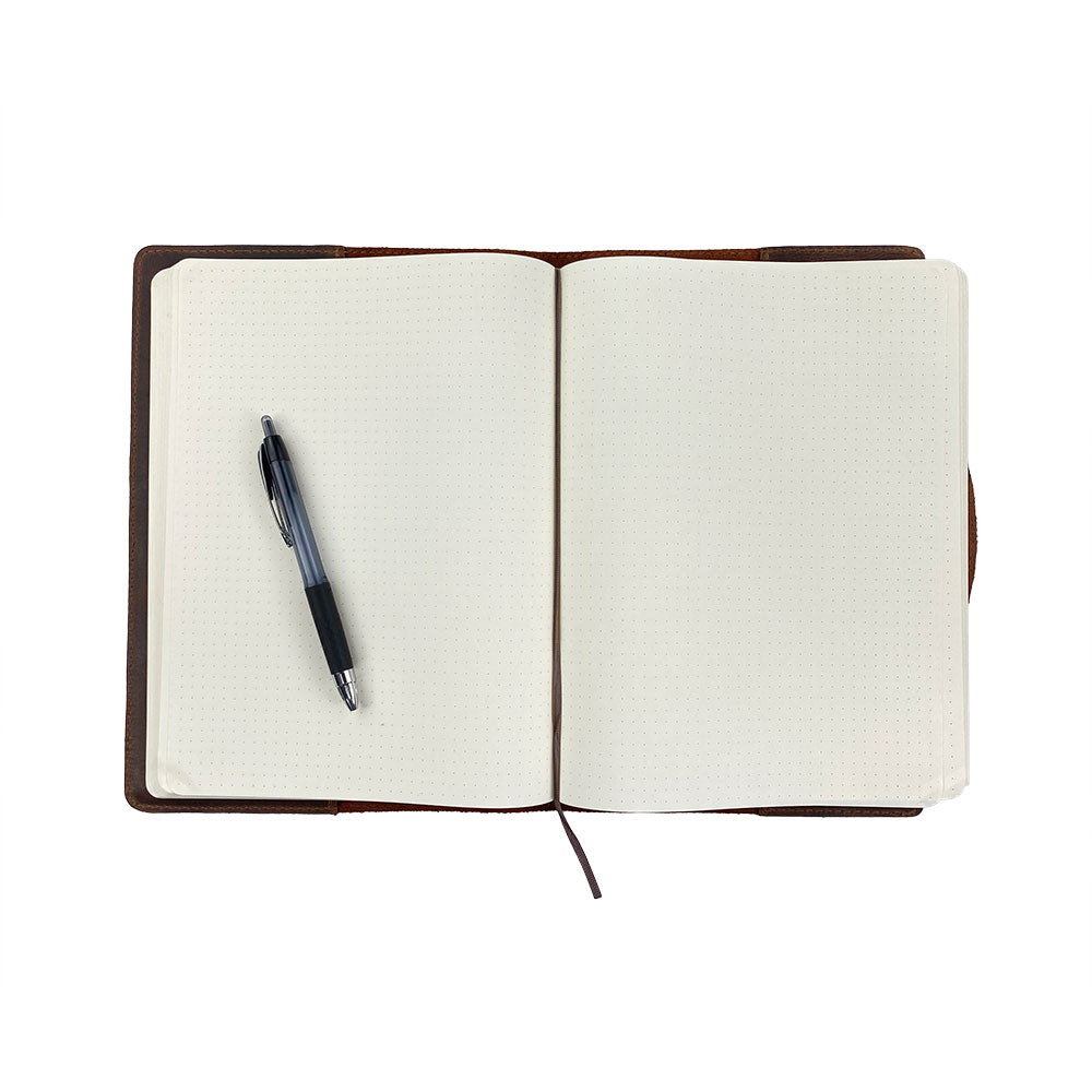 The stunning outer view of the Hard Cover Notebook Protector (Notebook NOT Included) by Hide & Drink, featuring a warm leather tone. This journal cover is designed for Moleskine Hard Cover Sketchbook XXL Size (8.5 x 11 in.), Notebook NOT Included, crafted from authentic Full Grain Leather available through StockyardX's small batch production ethos, ensured by hand cut, hand sewn, and fire branded artistry by artisans. Handmade in La Antigua Guatemala & Oaxaca Mexico.