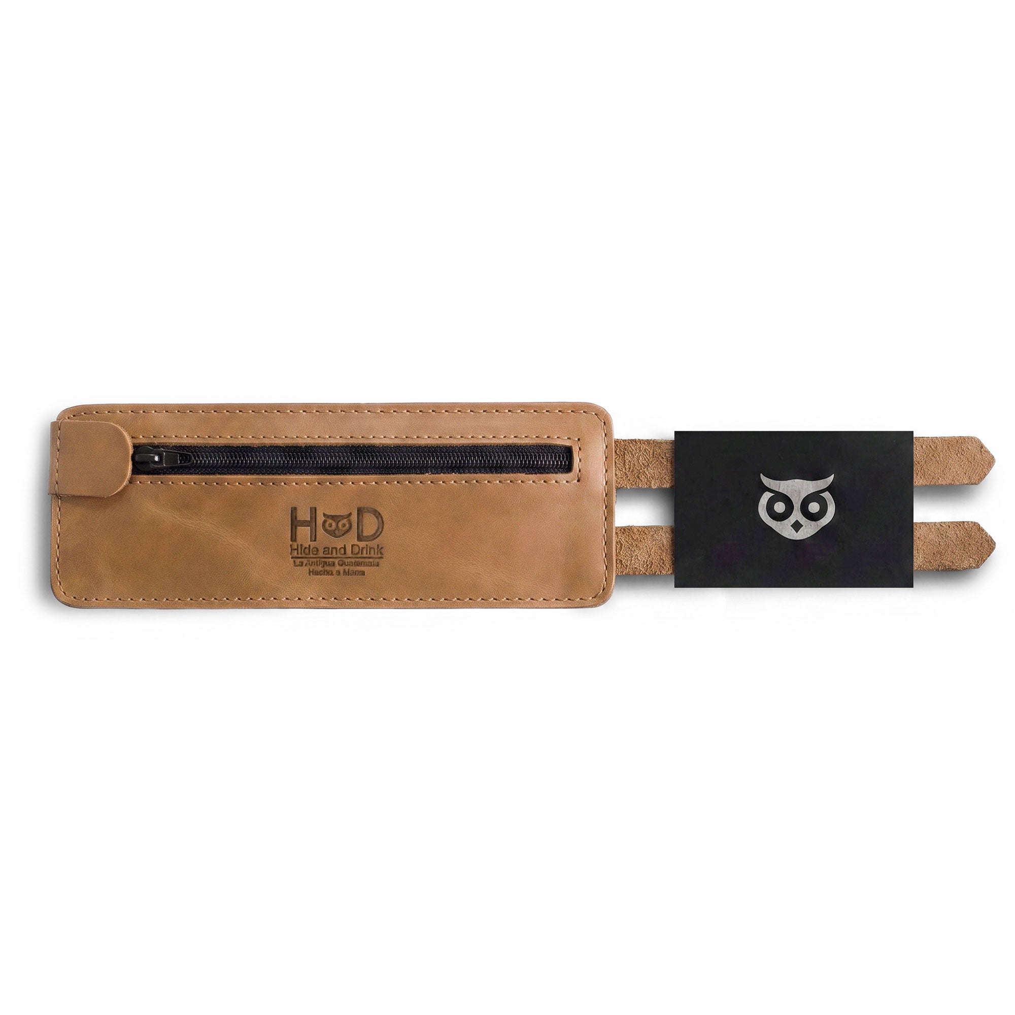 An elegant view of Hide & Drink's Wrist-Wallet-Cuff crafted from Full Grain Leather. This rustic leather bracelet boasts a hidden pouch for bills and an inner zippered pouch, perfect for the organized individual. Each handcrafted piece is made in La Antigua Guatemala & Oaxaca Mexico, emphasizing artisan quality and care.