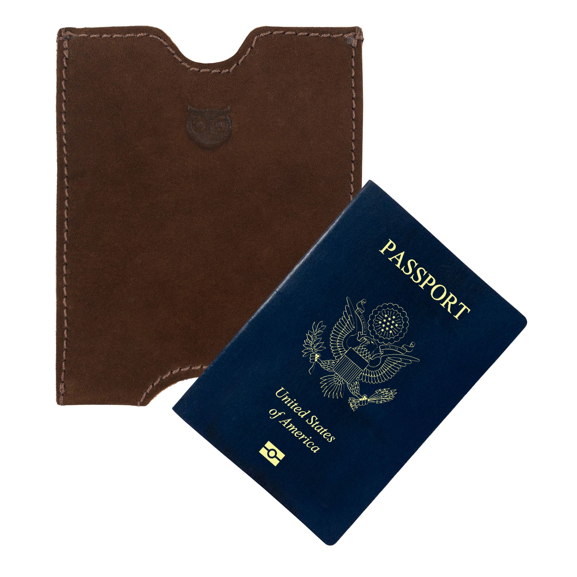 Hide & Drink Passport Sleeve next to a blue passport, showcasing its snug fit and vintage design. This Full Grain Leather Travel Passport Pocket Sleeve is expertly handcrafted and fire branded.