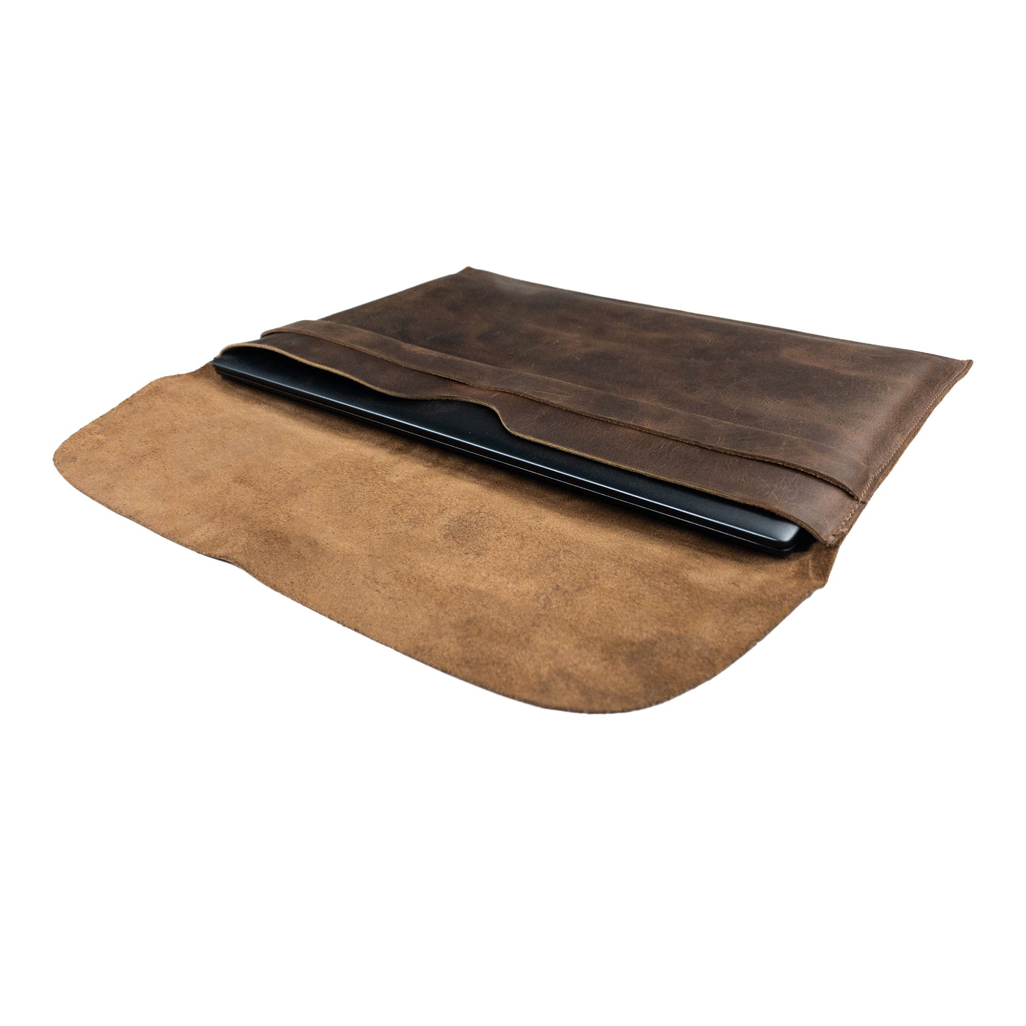 Open view of the Hide & Drink MacBook Slim Case, demonstrating its secure fit for MacBook Air/Pro 13 Inch with M1 Chip. This rustic leather case features hand sewn construction, making it both stylish and functional, a true artisan creation made in La Antigua Guatemala.