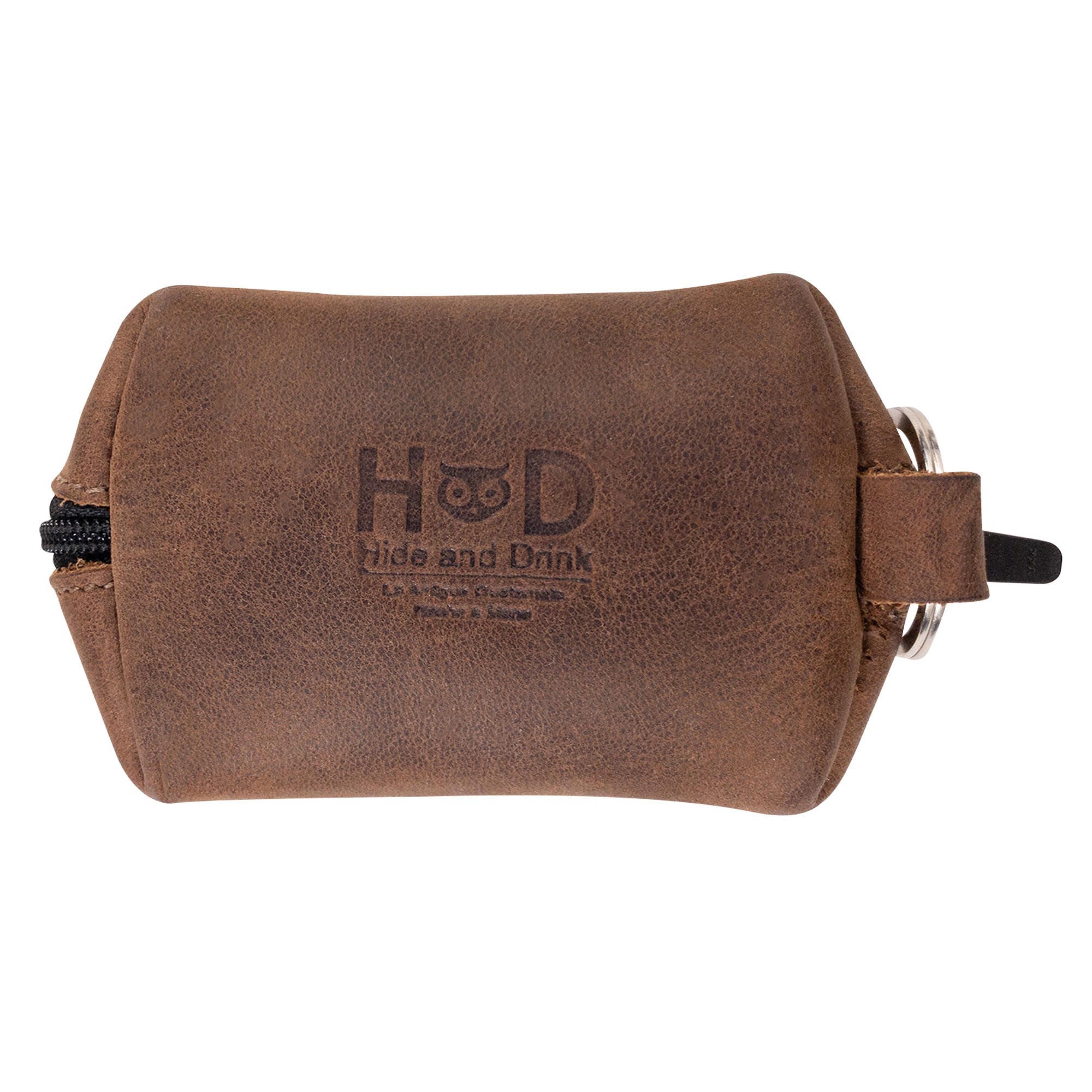 Hide & Drink’s Keychain Coin Pouch displaying the brand logo, a stylish accessory handmade from Full Grain Leather. Coin Pouch, Keychain, Wallet, Purse, Holder, SD Card, USB, Cash, Case, featuring artisan craftsmanship in La Antigua Guatemala & Oaxaca Mexico.