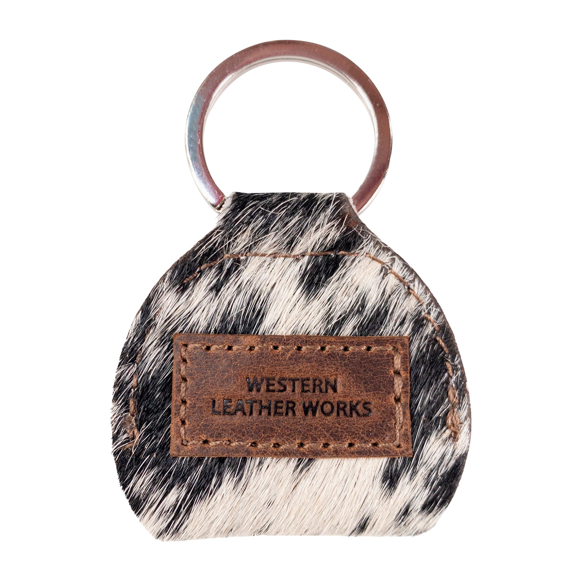 Stylish Guitar Pick Holder by Western Leather Works with a leather tag, made of Hair On Hide Full Grain Leather. A perfect example of small batch production, hand cut, hand sewn, and fire branded, showcasing artisan quality, handmade in La Antigua Guatemala & Oaxaca Mexico.