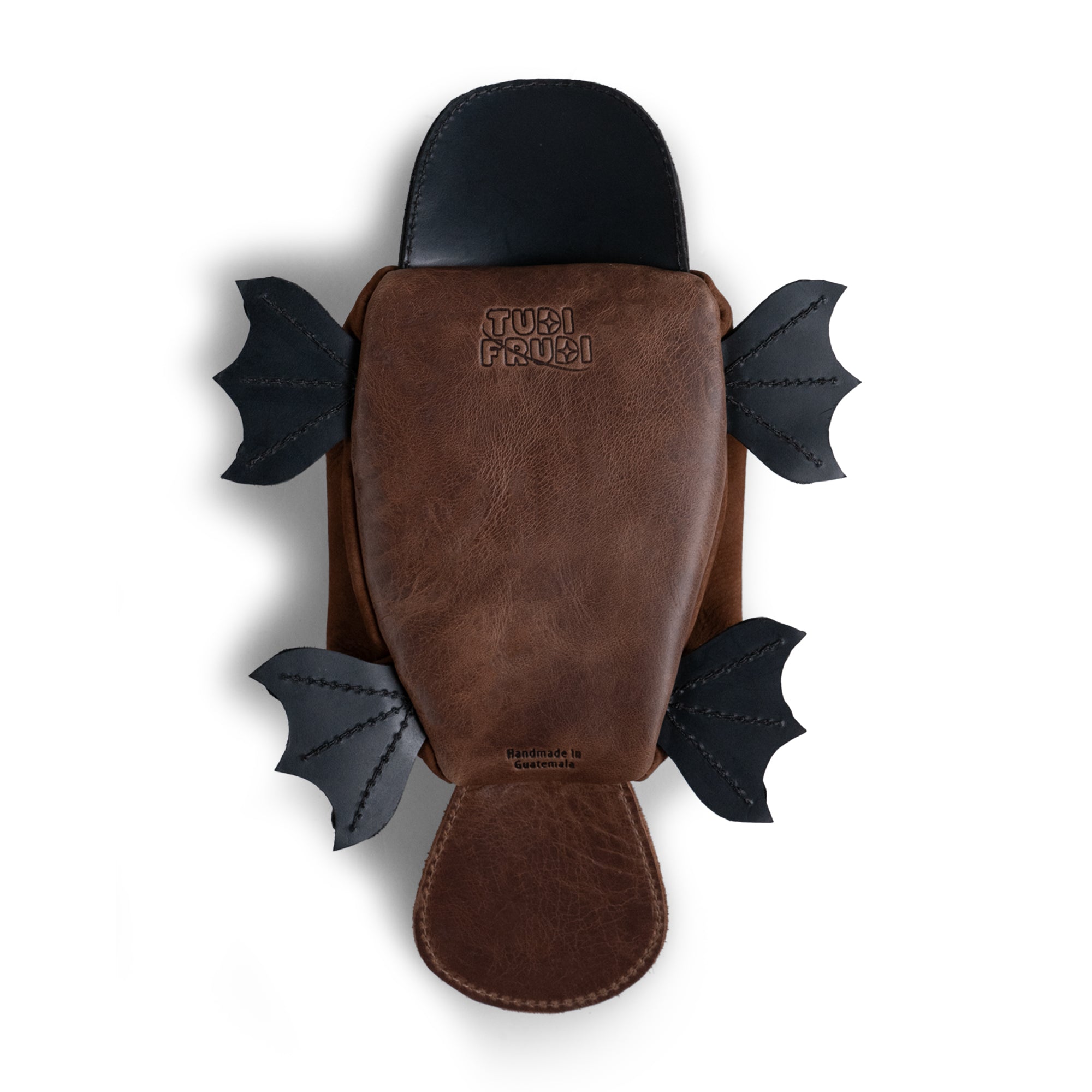 The underside of the Tudi Frudi Leather Platypus Pouch features unique detailing, emphasizing its artisan quality as a small coin organizer and zippered cash holder wallet for coins. Perfect for storing change, this money pouch for men and women exemplifies small batch production with hand cut, hand sewn craftsmanship, made from full grain leather in La Antigua Guatemala & Oaxaca Mexico.