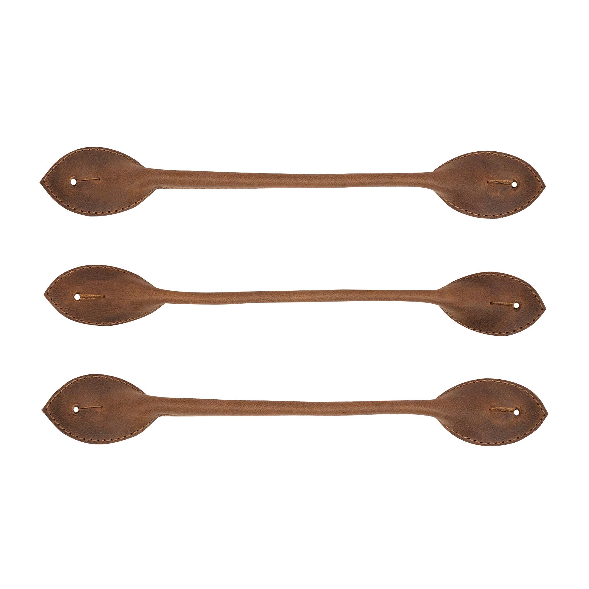 Top view of the Set of 3 Button End Attachments for Suspenders by Hide & Groom, featuring a sleek design in full grain leather. Ideal for dinner parties and formal events, these handmade accessories showcase small batch production and artisan quality from La Antigua Guatemala.