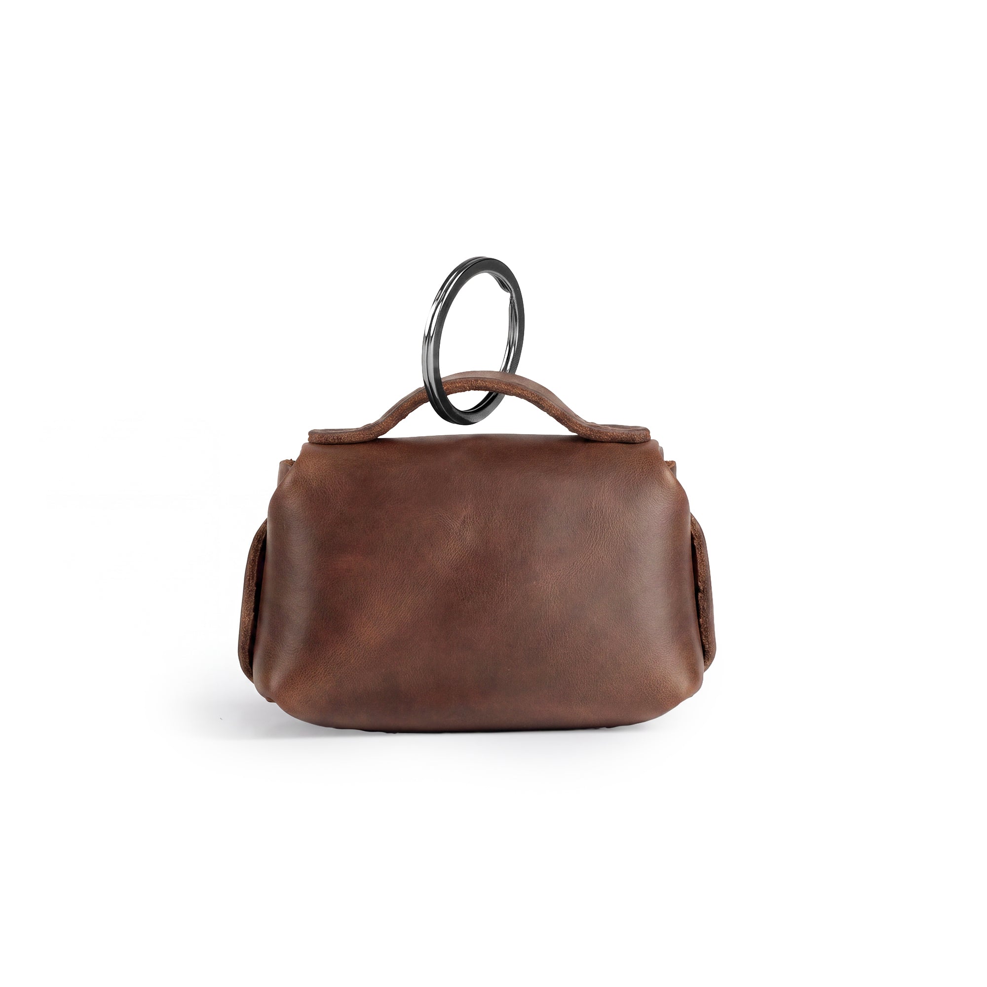 Back view of the Tiny Handbag Keychain, emphasizing its sleek design and key ring holder, created with full grain leather by Hide & Drink. This Tiny Handbag with Key Ring Holder represents small batch production, hand cut, hand sewn, and fire branded artistry, all handmade in La Antigua Guatemala & Oaxaca Mexico.