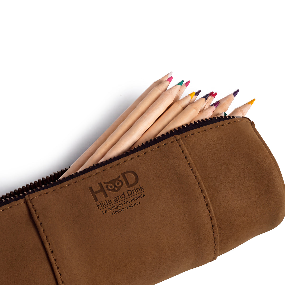 Utility Cylinder Case by Hide & Drink loaded with office supplies, showcasing its handmade craftsmanship and utility. This classic bag made from Full Grain Leather is perfect for organizing personal items. Cylinder Case, Handmade, Rustic.