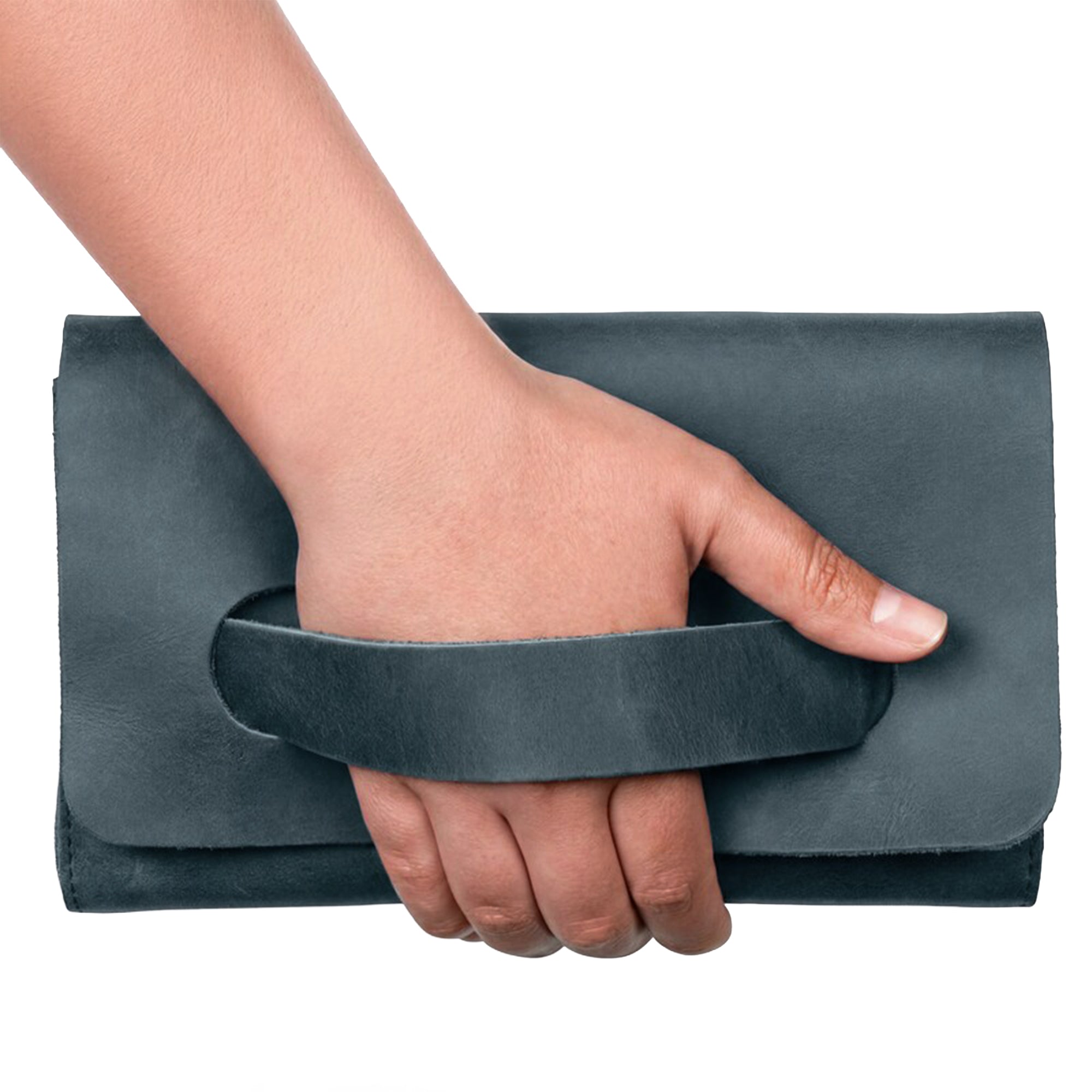 Stylish navy Clutch Bag With Handle by Hide & Drink, made from luxurious Full Grain Leather. This handbag for women is perfect as a night bag, featuring an artisanal touch through small batch production in Guatemala and Mexico.