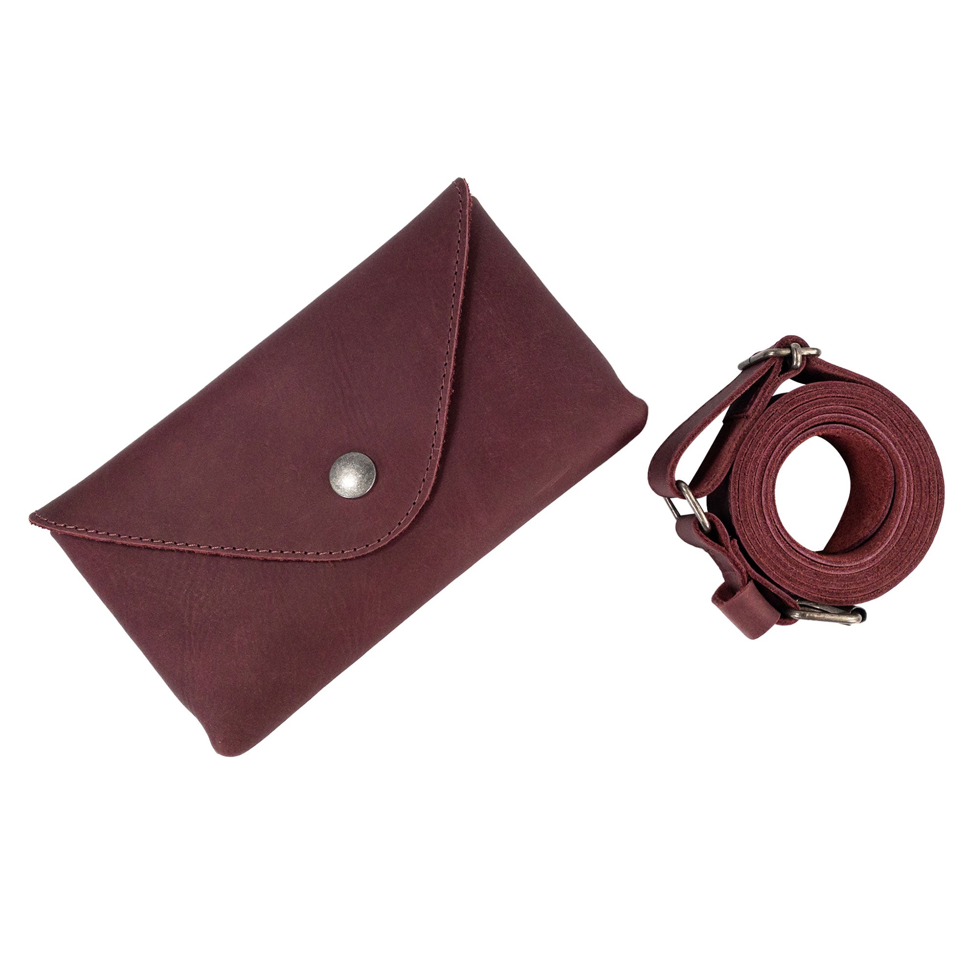 Elegant presentation of Hide & Drink's Fancy Fanny Pack, highlighting its versatility as a double-duty phone holder and fanny pack. Made of quality full grain leather, it's perfect for stylish travel.