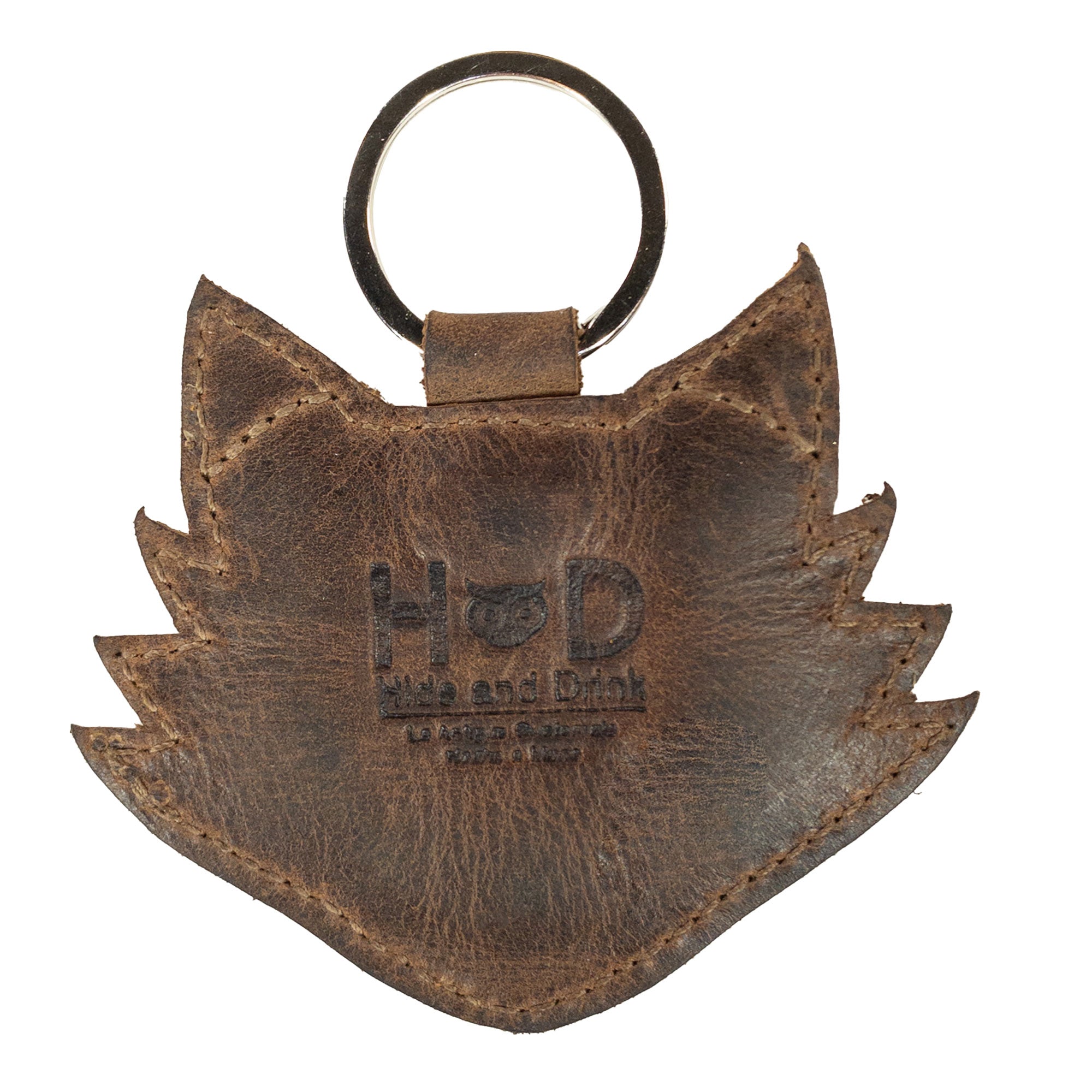 Back view of the Fox Keychain from Hide & Drink showcasing the branding. This handmade key ring is crafted from High Quality Full Grain Leather, symbolizing wildlife-inspired artistry and a commitment to small batch production made in La Antigua Guatemala & Oaxaca Mexico.