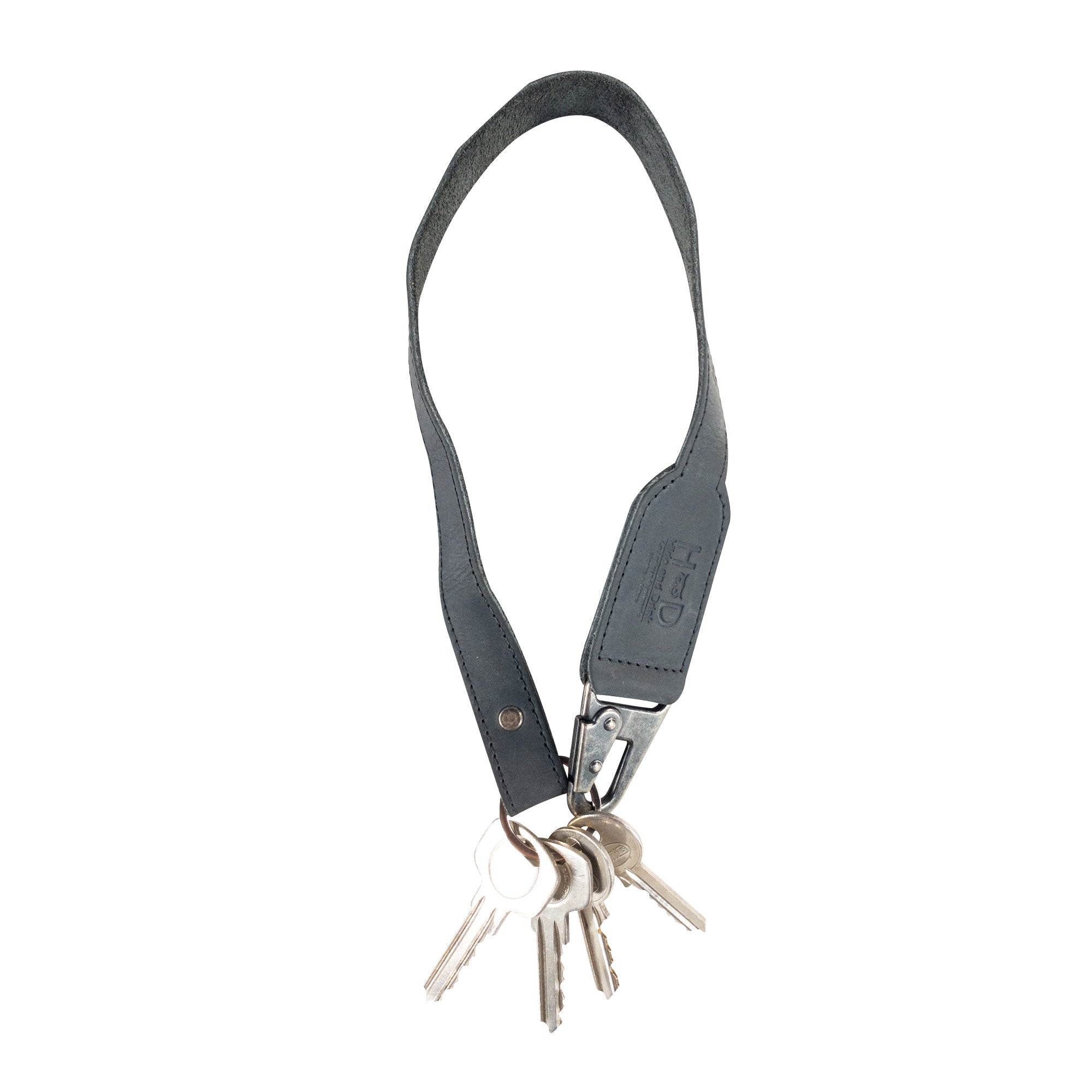 Hide & Drink Keychain Lanyard in tasteful Full Grain Leather, equipped with a convenient clip for secure key attachment. This product embodies small batch artisan craftsmanship.