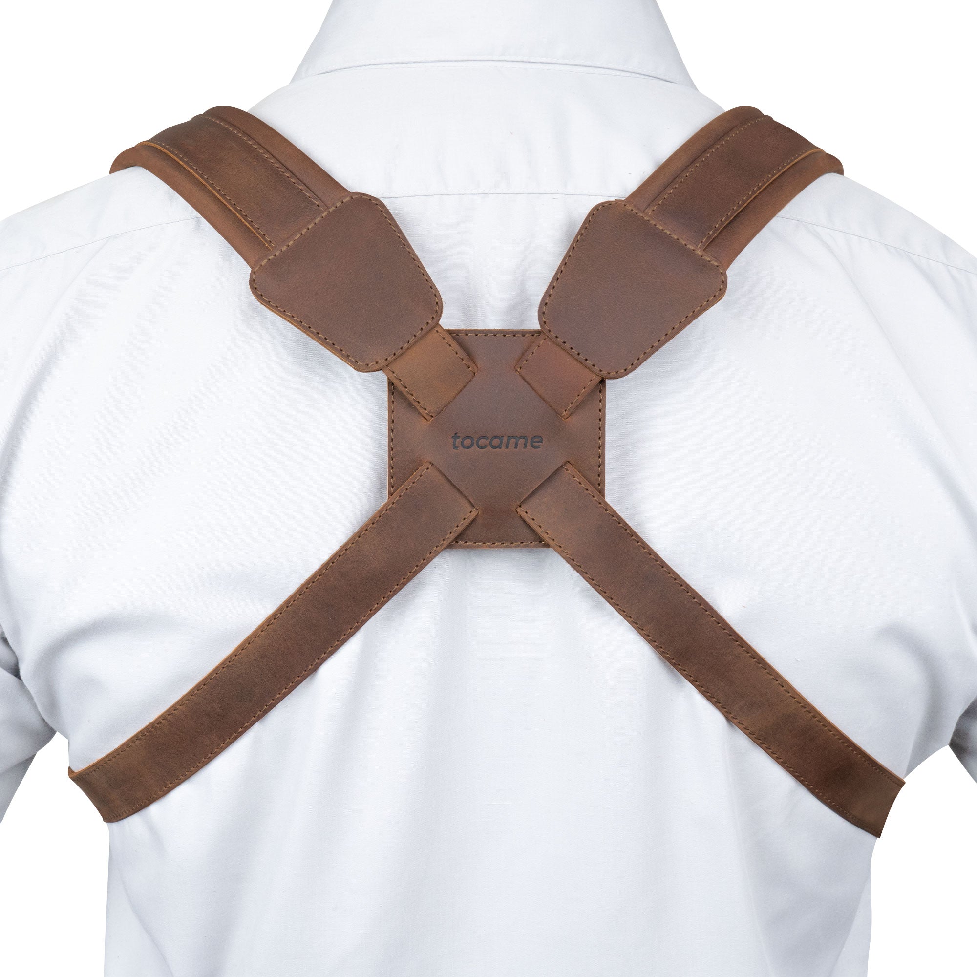 Rear view of the Ajustable Harness for Alto & Tenor Saxophone by tocame, displaying the padded back support that offers comfort during use. This full grain leather harness is essential for marching bands and is a testament to artisan skills from small batch production in La Antigua Guatemala and Oaxaca Mexico.