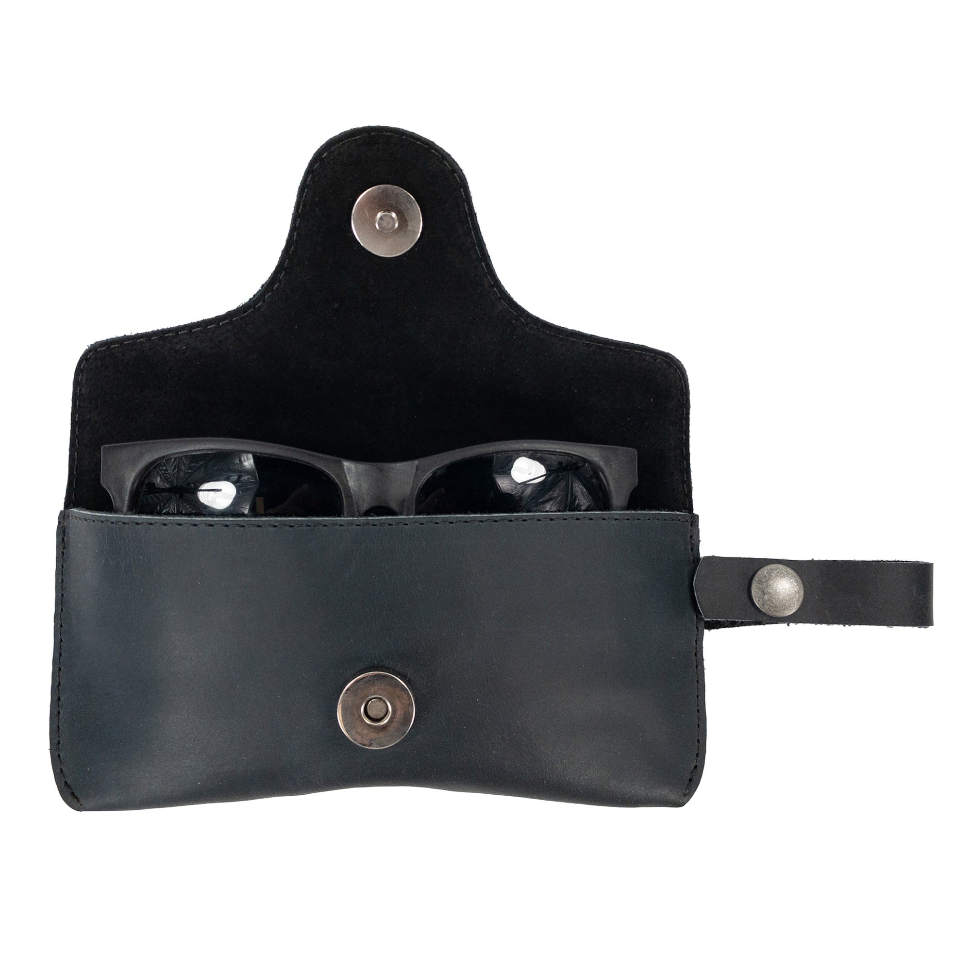 Open Eyeglasses Case with Strap by Hide & Drink, ideal for holding sunglasses. Featuring full grain leather craftsmanship, this protector for eyewear embodies the artisanal spirit of small batch production in La Antigua Guatemala & Oaxaca Mexico.