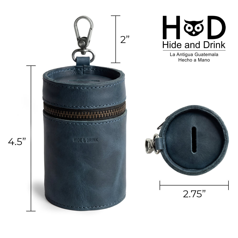 Detailed view of Hide & Drink Bucket Coin Release highlighting dimensions. This handy coin case, crafted from full grain leather, doubles as a stylish money box and zippered pouch. Artisanally handmade in La Antigua Guatemala & Oaxaca Mexico with careful attention to detail.