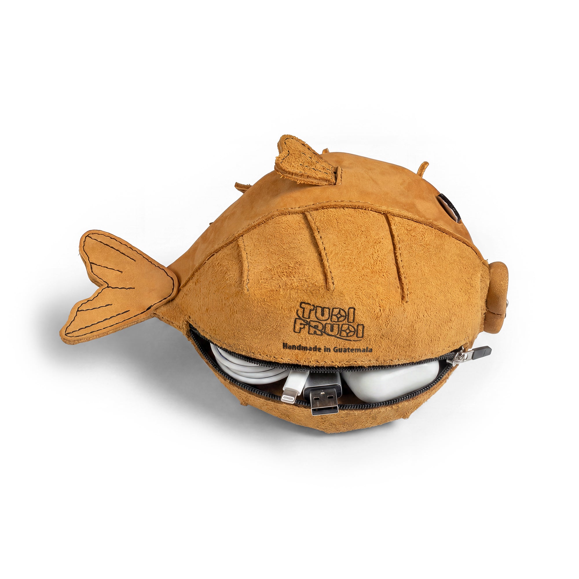 Top view of the Leather Pufferfish Pouch from Tudi Frudi, ideal for use as a zipper wallet for coins or a small accessory case. Each piece is meticulously handcrafted in La Antigua Guatemala and Oaxaca Mexico, highlighting artisan small batch production.