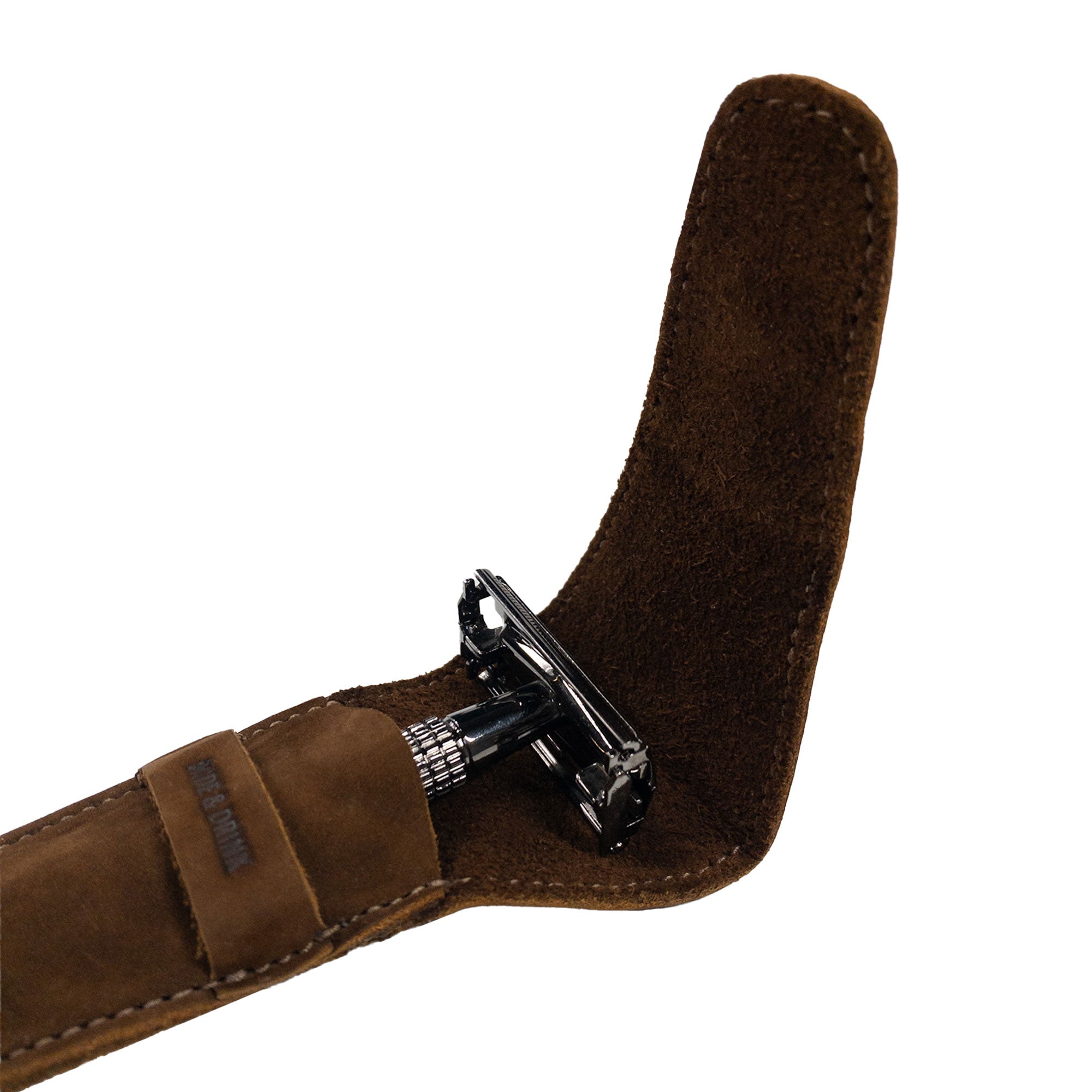 Another angle of the Safety Razor Case by Hide & Drink, emphasizing the elegant design and quality materials. This Full Grain Leather accessory supports artisan production techniques and is perfect for personal care while traveling.