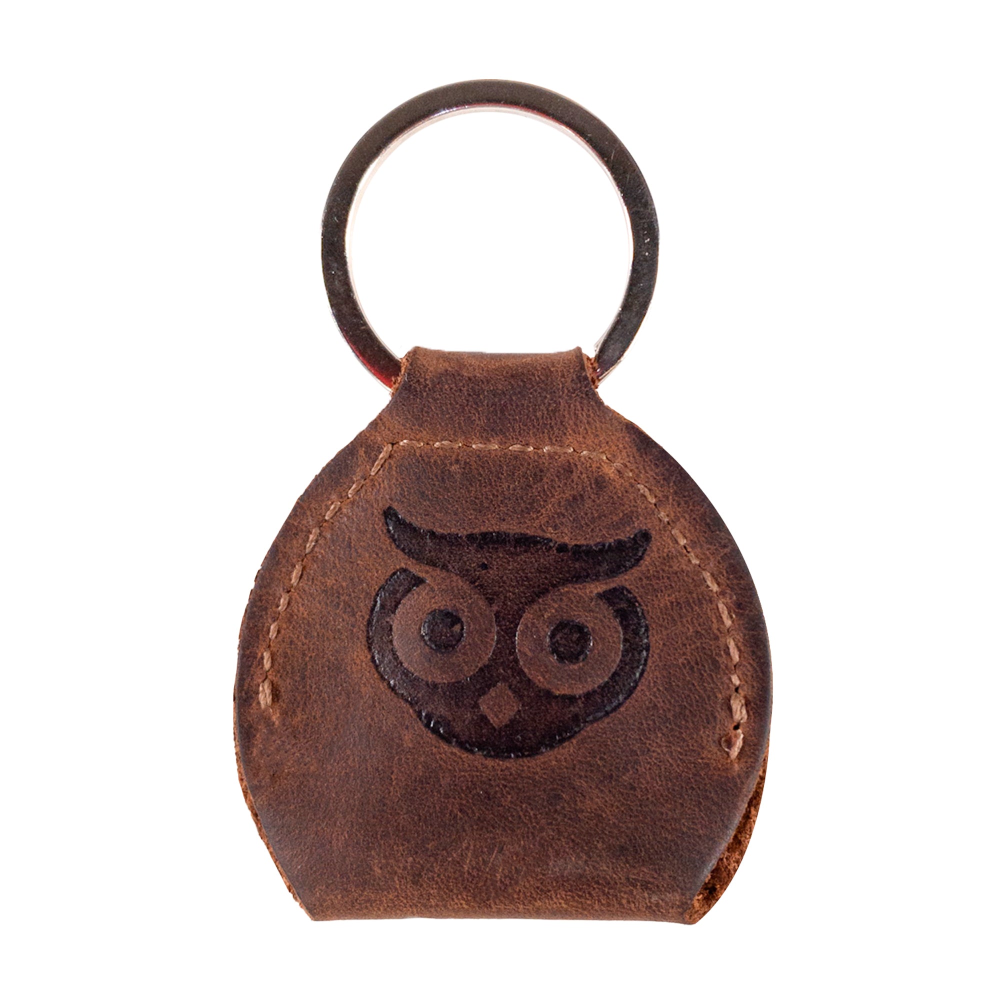 Displaying the unique style of the Key Chain & Guitar Pick Holder by Hide & Drink, this image highlights the Guitar Pick Holder with Ring, ideal for key organization. Made from premium Full Grain Leather, this handmade product reflects small batch production techniques, showcasing hand cut, hand sewn artistry in La Antigua Guatemala & Oaxaca Mexico.