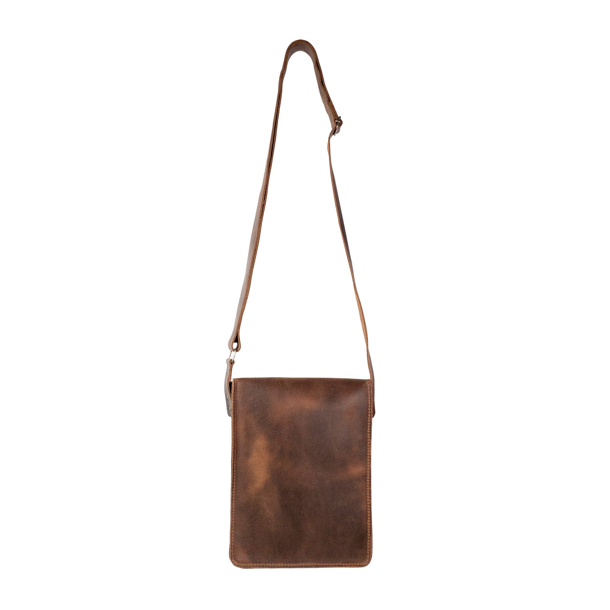 Rear view of the La Antigua Treasure Crossbody Bag showcasing its sleek style and durable construction. This rustic crossbody bag with an adjustable strap is a versatile travel accessory made from artisan-crafted full grain leather in La Antigua Guatemala.
