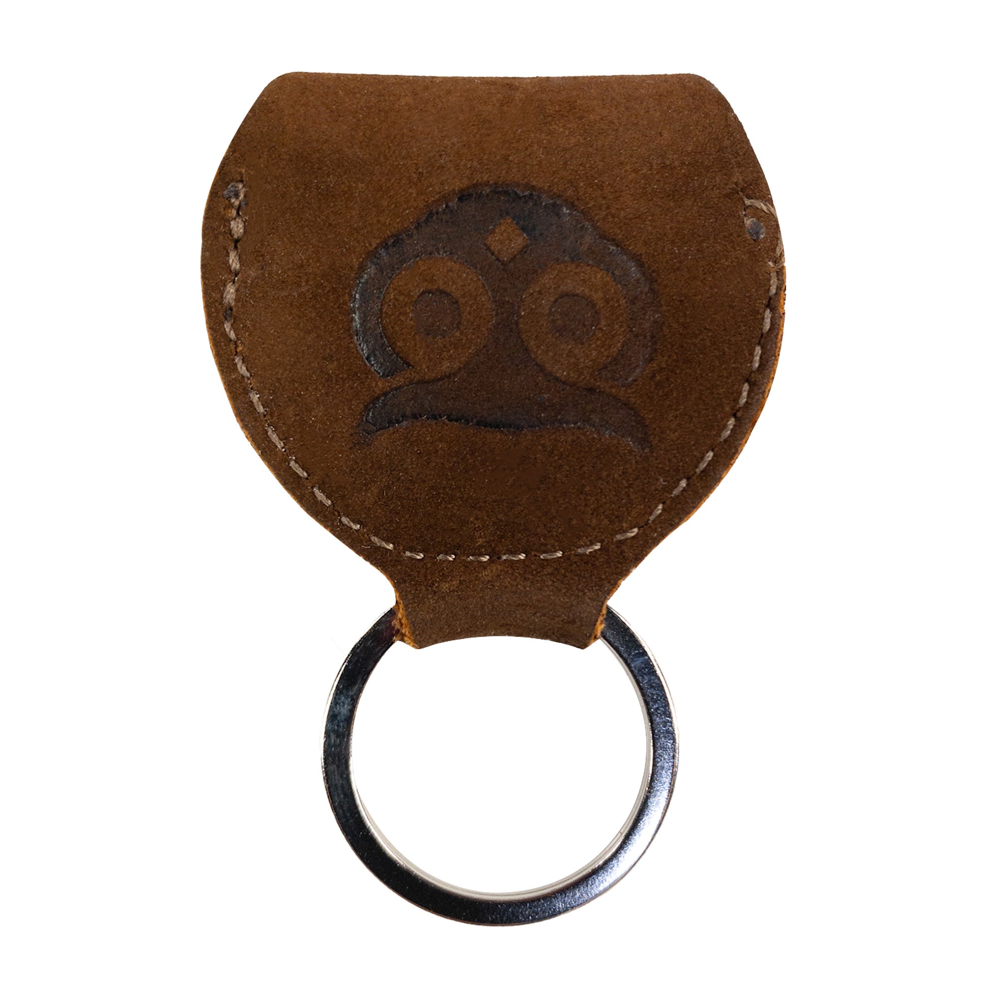 Close up of the Key Chain & Guitar Pick Holder from Hide & Drink, showing the intricate details of the Guitar Pick Holder with Ring. This fully functional key organizer is designed for guitar players, made from Full Grain Leather, crafted in small batches with hand cut and hand sewn precision, featuring artisan craftsmanship and a fire branded finish, handmade in La Antigua Guatemala & Oaxaca Mexico.