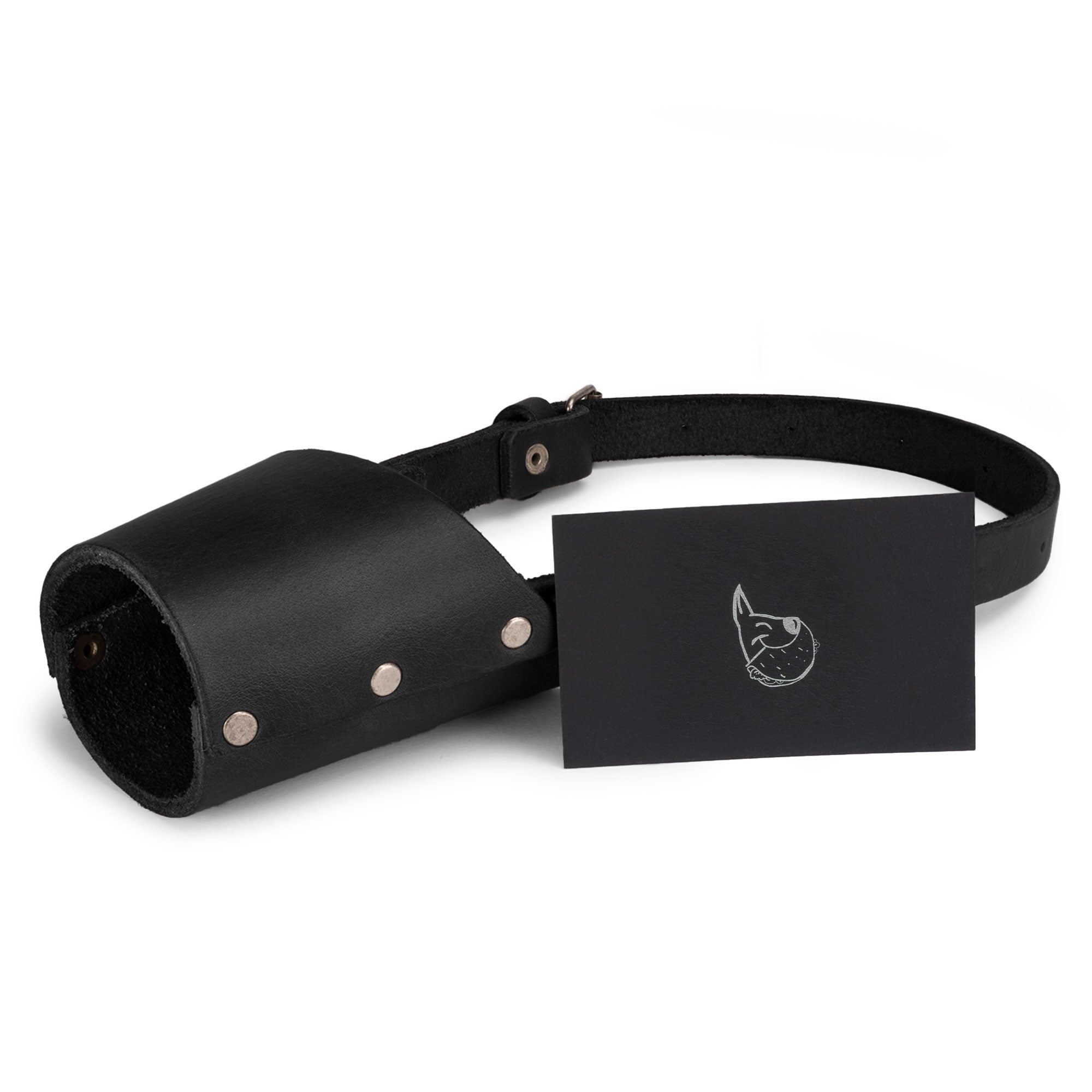 Taco Dog Dog Muzzle shown in detail, highlighting its sturdy construction from full grain leather. This handcrafted muzzle secures your dog's mouth while preventing unwanted behavior.
