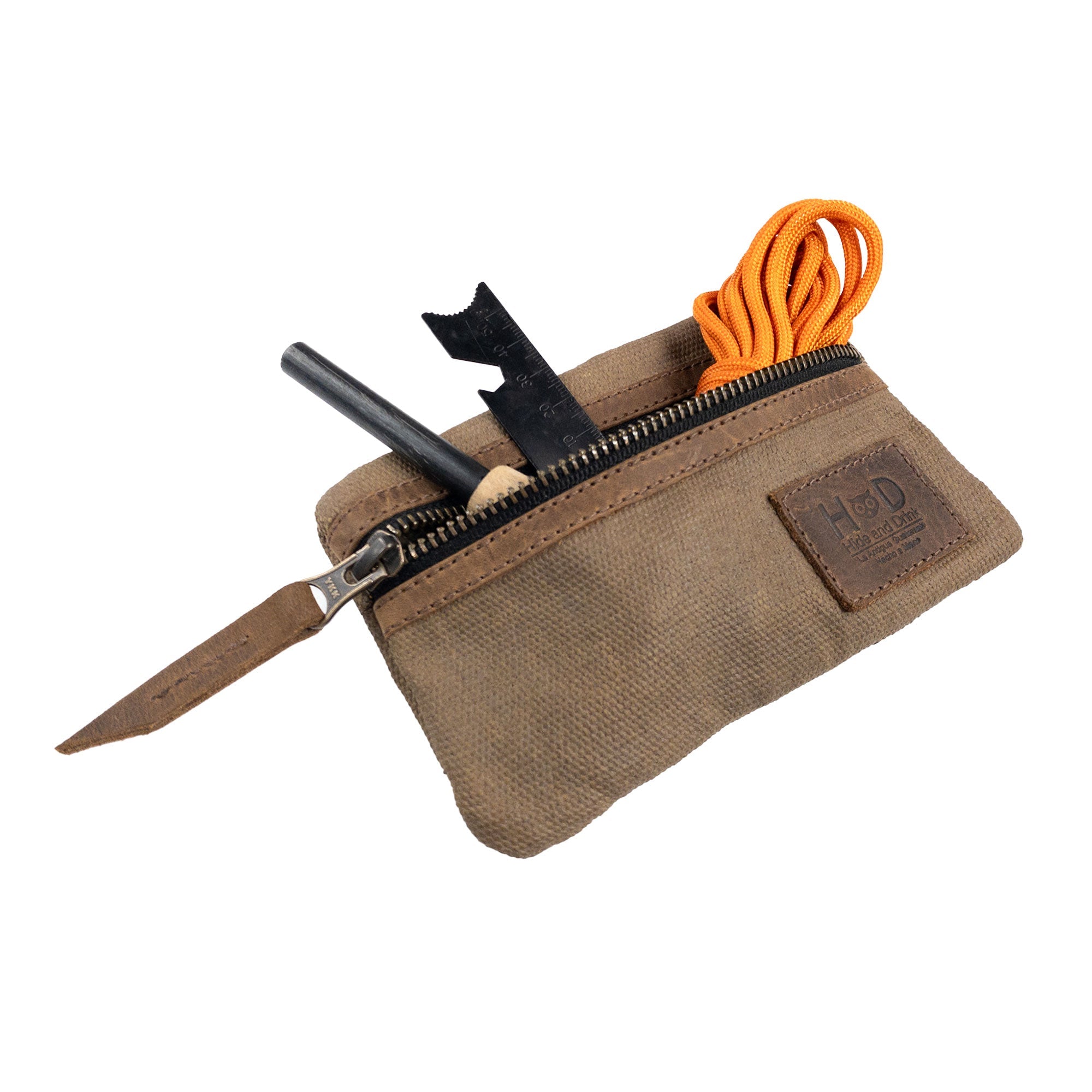 Open Multi-tool Pocket Pouch by Hide & Drink, displaying its functional interior that serves as a compact multipurpose camping tool case, made by artisans in La Antigua Guatemala.