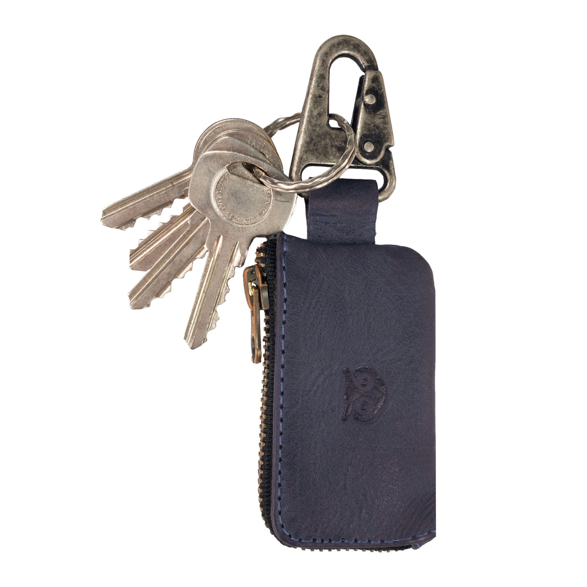 Close-up of Hide & Drink Car Key Holder displaying keys attached, designed to also accommodate cash and accessories like headphone and charging cables, with a sturdy Nickel Metal Clasp for easy access. StockyardX, Small Batch Production, Hand Cut, Hand Sewn, Fire Branded, Artisan, Handmade in La Antigua Guatemala & Oaxaca Mexico.