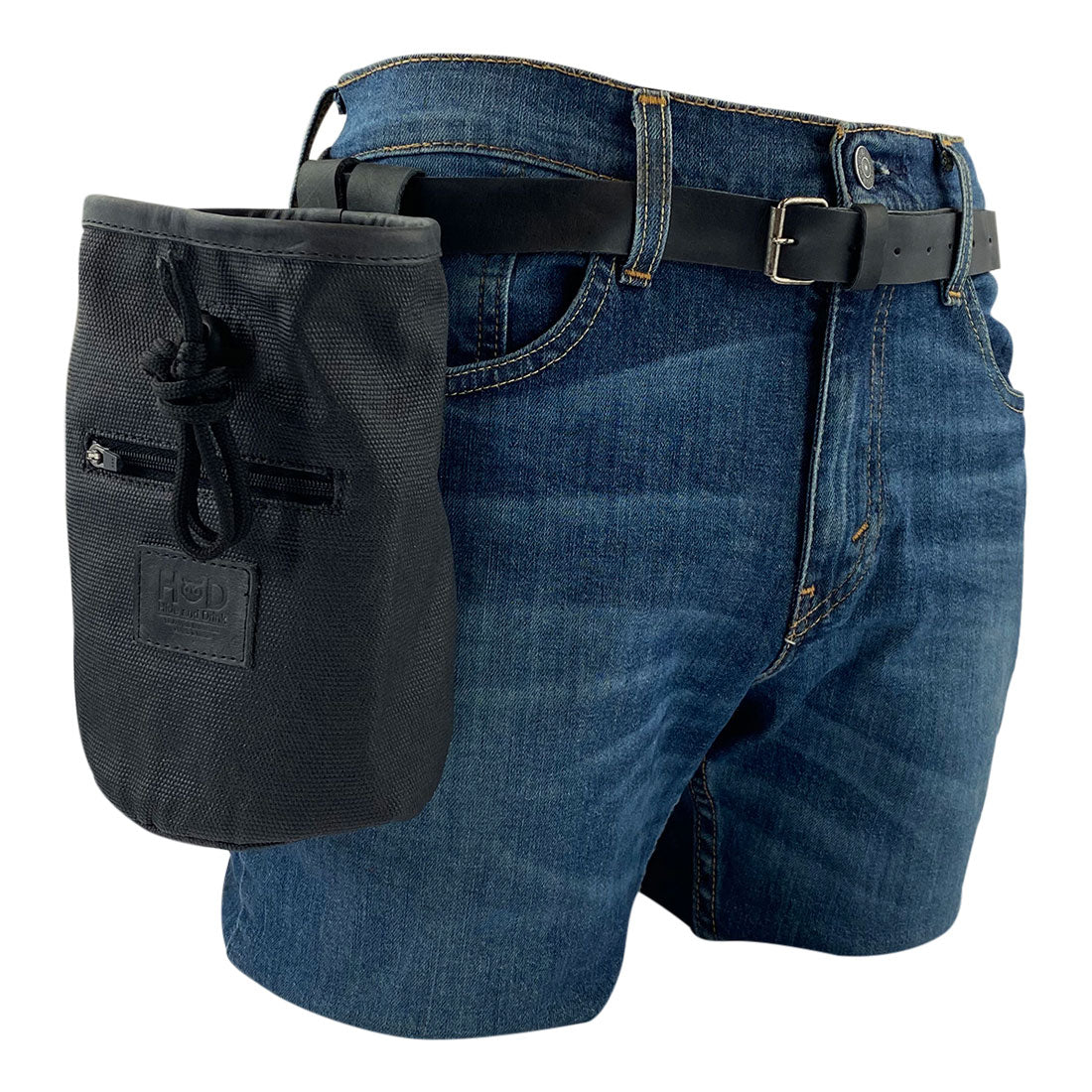 Hide & Drink Chalk Bag displayed with a model, demonstrating its use for gym and climbing activities. This bag, made of Waxed Canvas and Full Grain Leather, features a zippered pocket and is handmade by artisans in La Antigua Guatemala & Oaxaca Mexico.