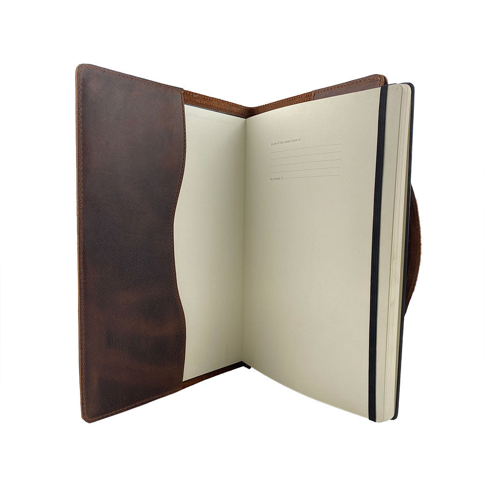 Inside view of the Hard Cover Notebook Protector (Notebook NOT Included) by Hide & Drink, showing the hand stitched details and blank inner pages. This journal cover is made for Moleskine Hard Cover Sketchbook XXL Size (8.5 x 11 in.), not included, crafted from Full Grain Leather. It's a part of StockyardX's small batch production, expertly hand cut, hand sewn, and fire branded by skilled artisans in La Antigua Guatemala & Oaxaca Mexico.