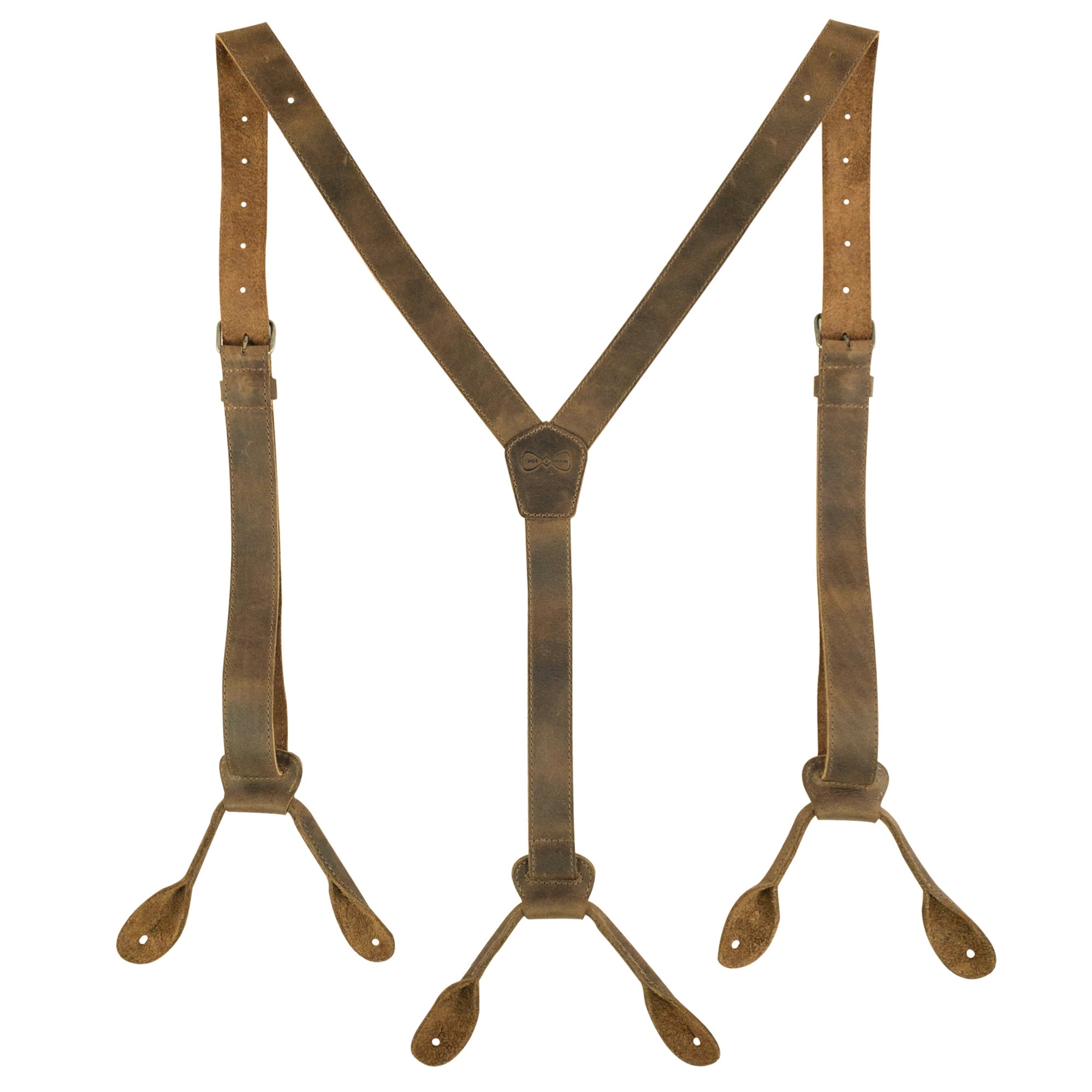 Y Back Button End Suspenders by Hide & Groom displayed with a perfect Y-back shape, suited for weddings and dinner parties. Each pair is made from high-quality full grain leather, showcasing the dedication to artisan craftsmanship through hand cutting and sewing, emphasizing unique style and durability.