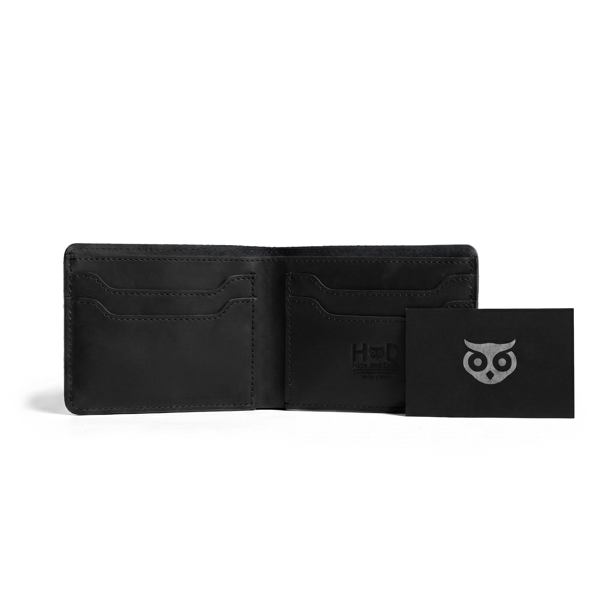 Classic dark brown wallet from Hide & Drink highlighted for its exquisite design. This Classic Bifold Wallet acts as a useful storage case for identification, crafted from durable Full Grain Leather. Ideal as a travel accessory, it emphasizes artisan workmanship through small batch production, hand cut and sewn in La Antigua Guatemala & Oaxaca Mexico.