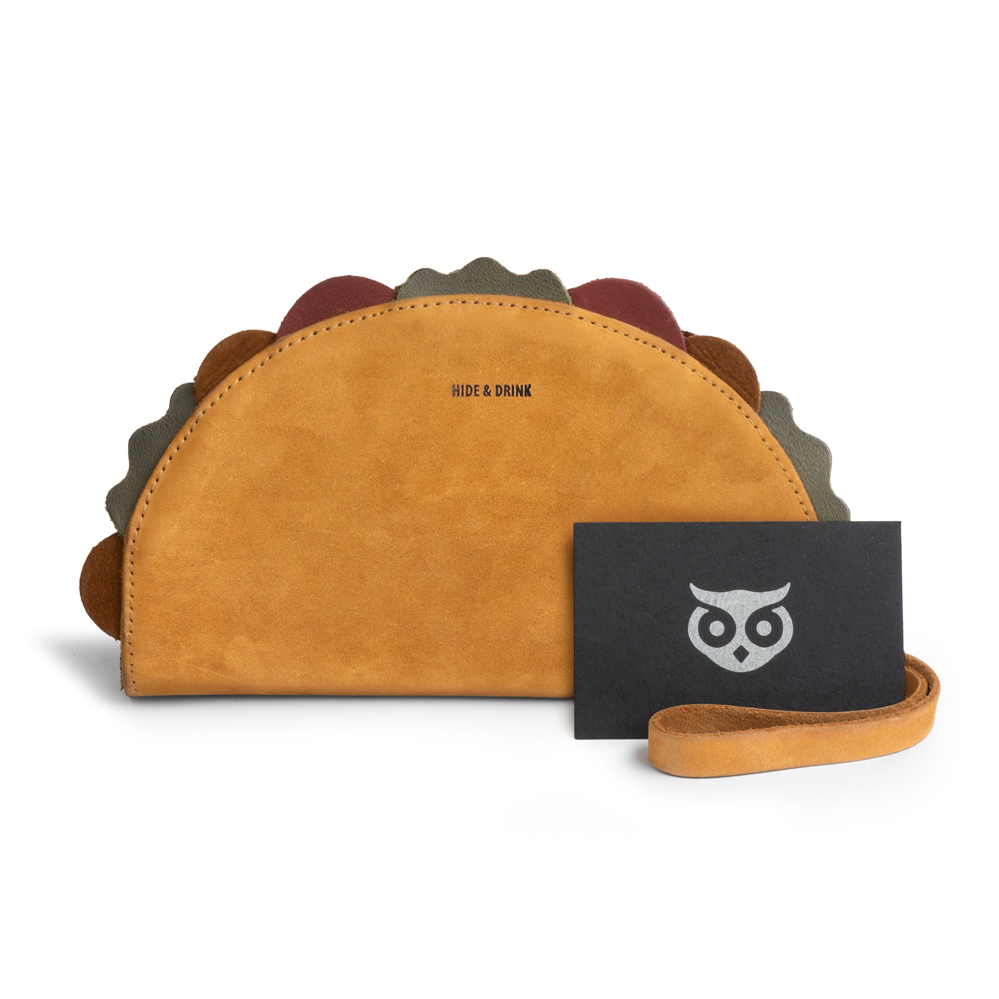 The front view of the Multipurpose Taco Wallet by Hide & Drink, highlighting its rustic charm and Full Grain Leather texture. A great accessory to elevate your travel and back-to-school vibe, this fun wallet also doubles as a perfect gift idea for graduation or gifts for him, fitting seamlessly into your wallets and women's collection.