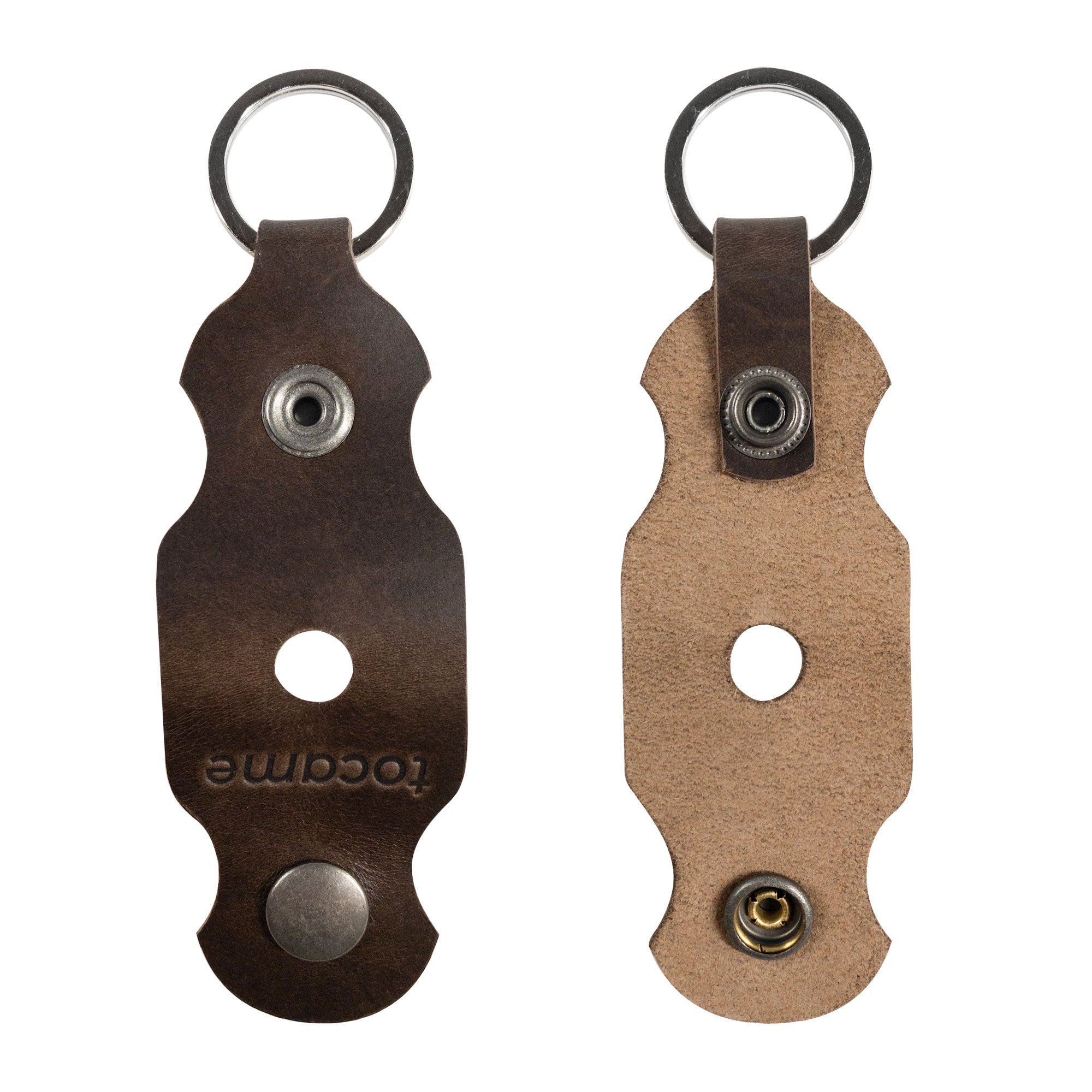 A detailed shot of a leather keychain from tocame featuring the Set of 2 Keychains for Drum Tunners (Not Included). This key organizer is made from fine full grain leather, perfect for drummers and musicians. Handmade with precision, these keychains reflect the artistry of small batch production from La Antigua Guatemala & Oaxaca Mexico.