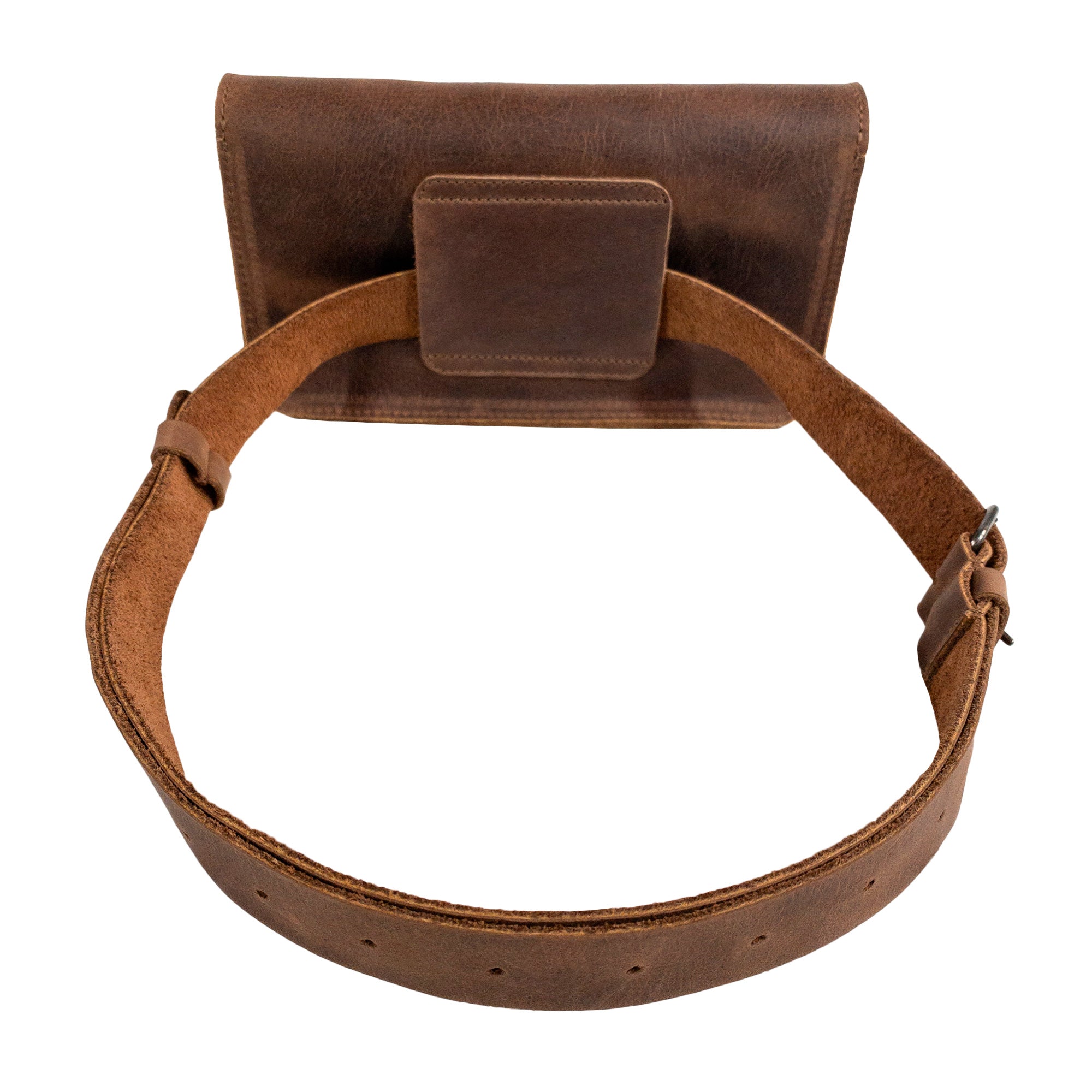 Back view of Heather's Rectangular Fanny Pack, highlighting its sturdy construction and adjustable strap. This stylish hip bag for women is crafted from full grain leather and designed for versatility. Handmade in La Antigua Guatemala & Oaxaca Mexico, each piece embodies artisan quality and small batch production.