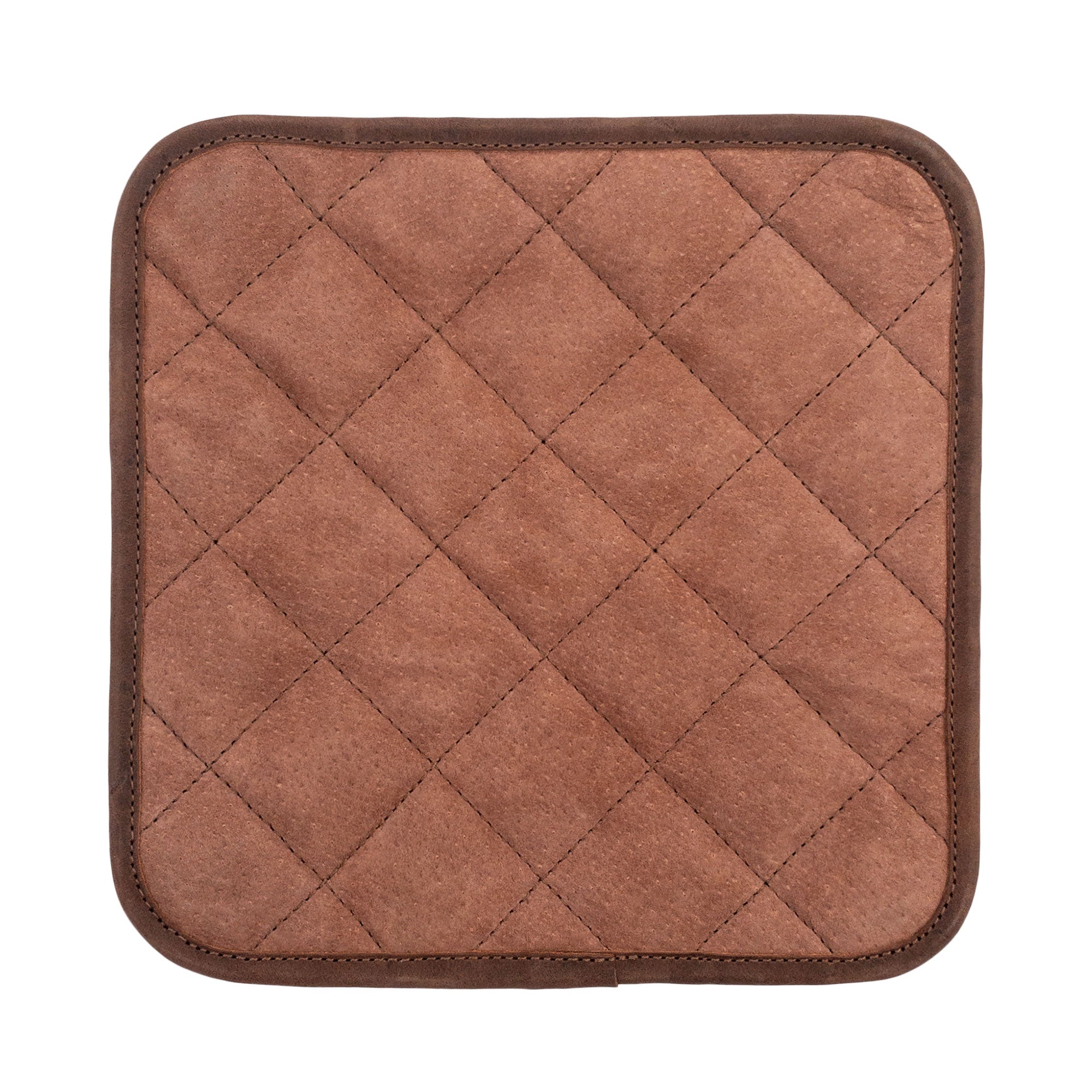 A top-down view of the Cast Leather Co. Squared Hot Pot Pad, emphasizing its quality and detail. This Squared Oven Mitt Heat Resistant, Hot Pot Pad (Potholder) is essential for bakery supplies, fashioned from full grain leather and sheepskin. Showcasing stockyardX's small batch production, it is hand cut, hand sewn, and fire branded in La Antigua Guatemala & Oaxaca Mexico.