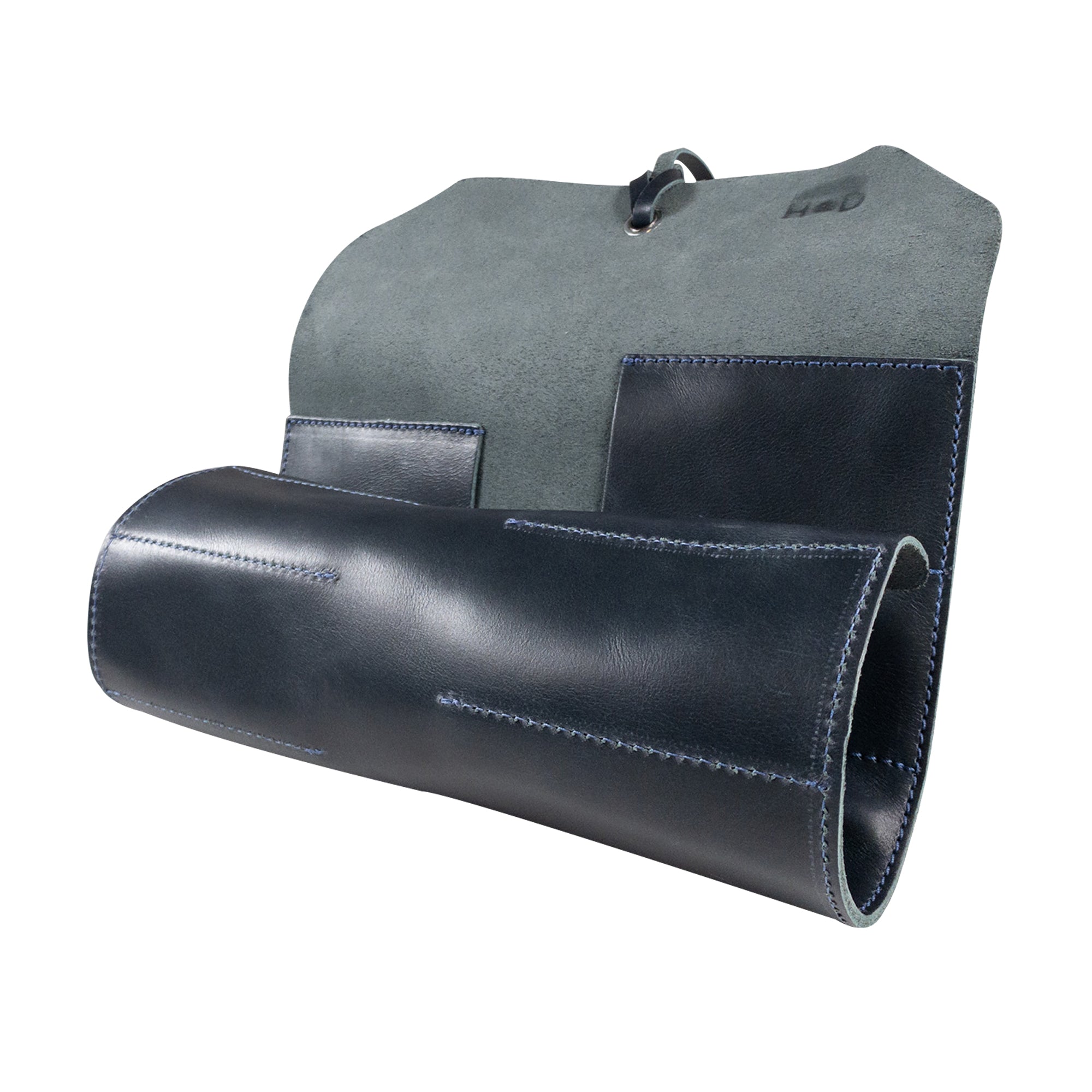 Hide & Drink Tool Roll features a chic small tool roll-up bag with 10 slots, constructed using fine full grain leather. Ideal as a portable carry-on pouch for organizing woodworking tools, this bag elevates your workshop storage solution. Each product is handcrafted in La Antigua Guatemala & Oaxaca Mexico, emphasizing artisan quality.